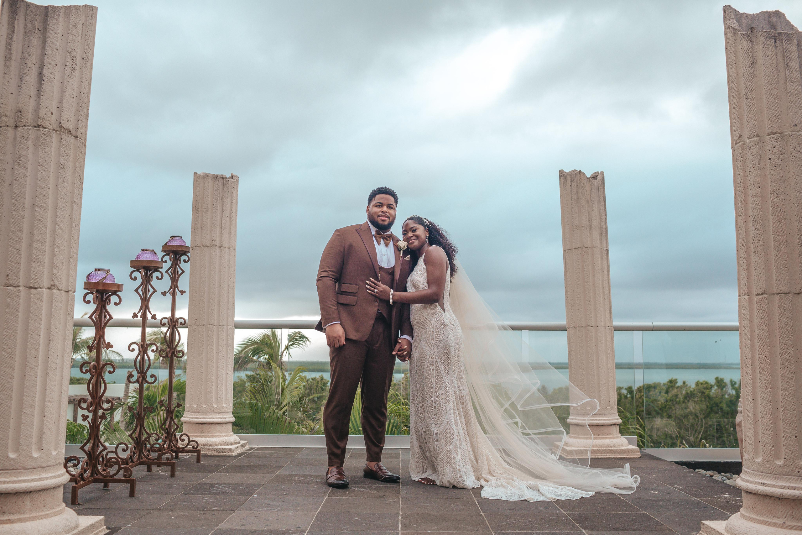 Elegant couple during vows at luxury Riviera Maya resort