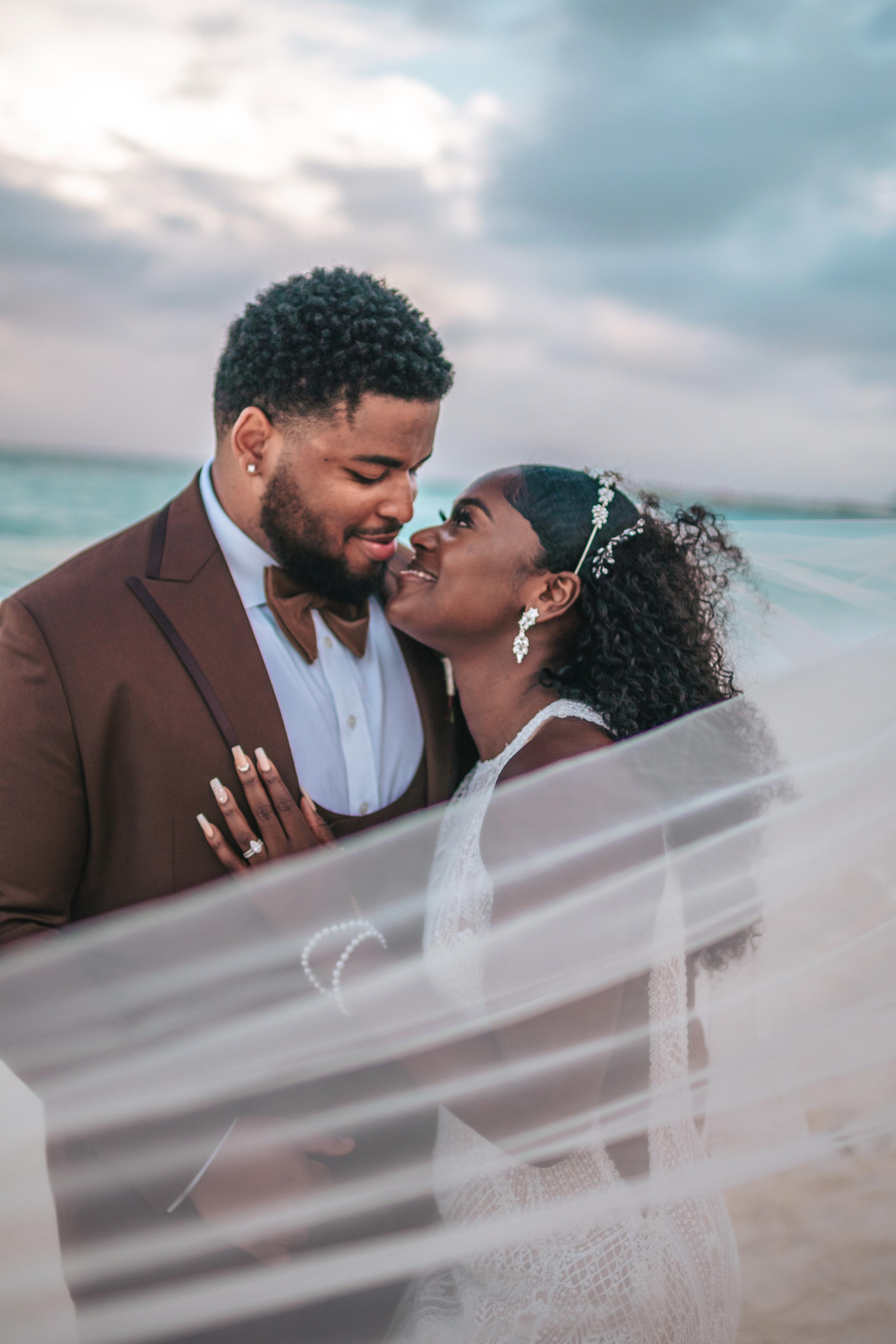 When it rains on your wedding day – Playa Mujeres romantic shoot