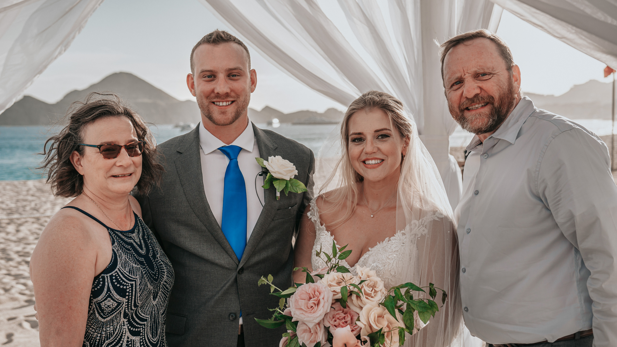 Private beach ceremony captured in golden light near Cabo
