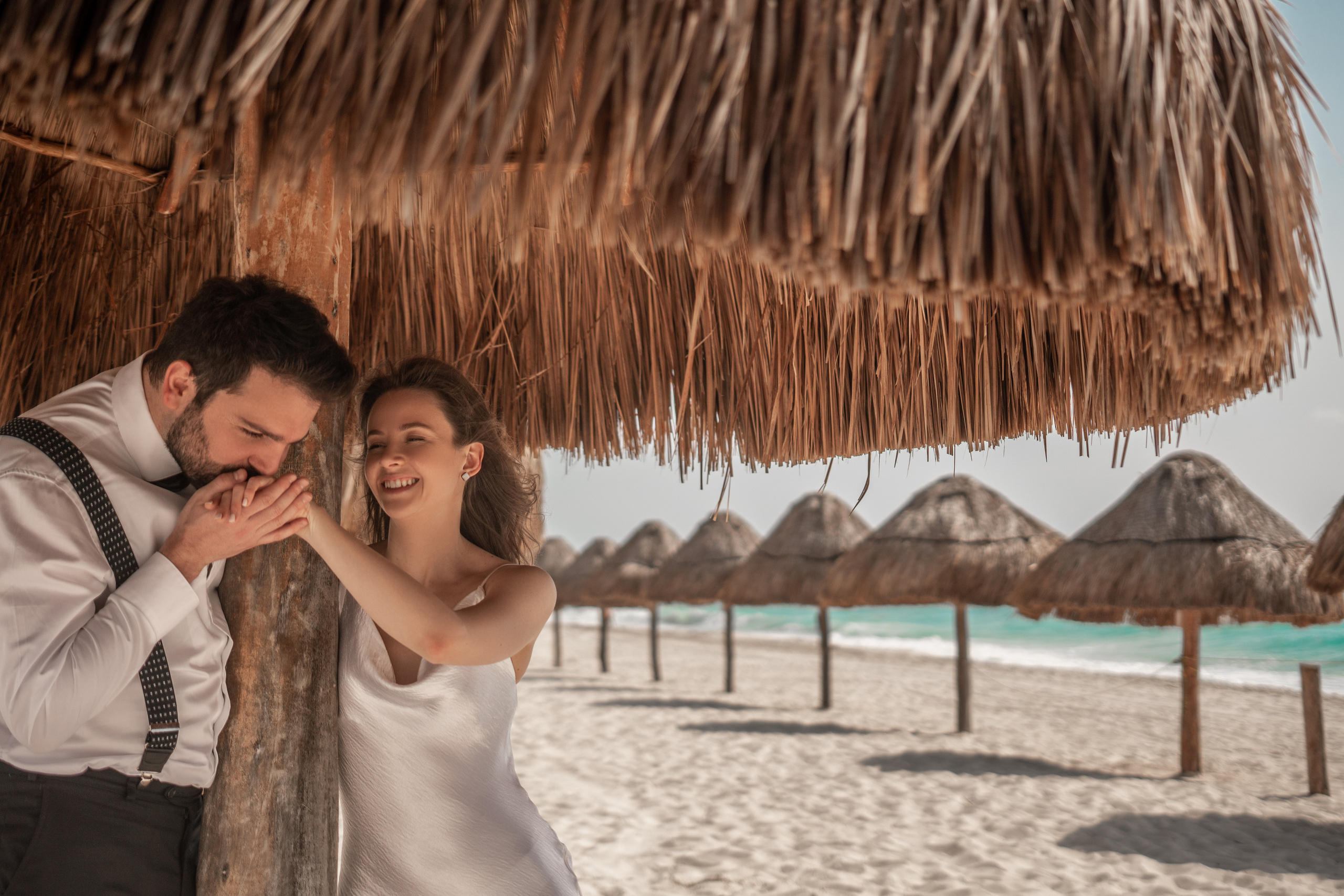Love story photos by the Caribbean Sea in Mexico