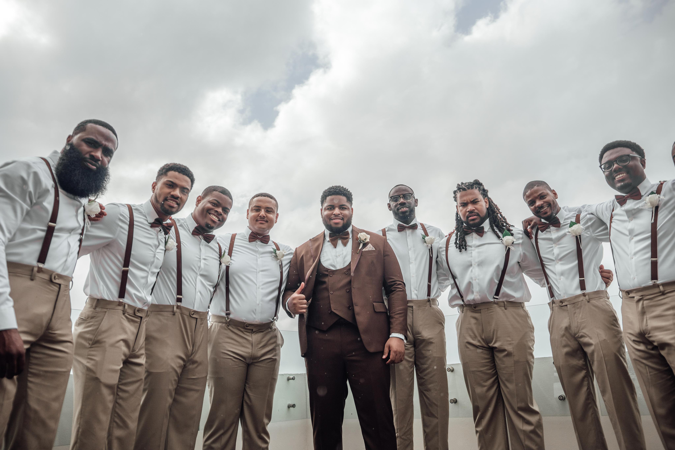 Group photo of groom and groomsmen at Mexico destination wedding