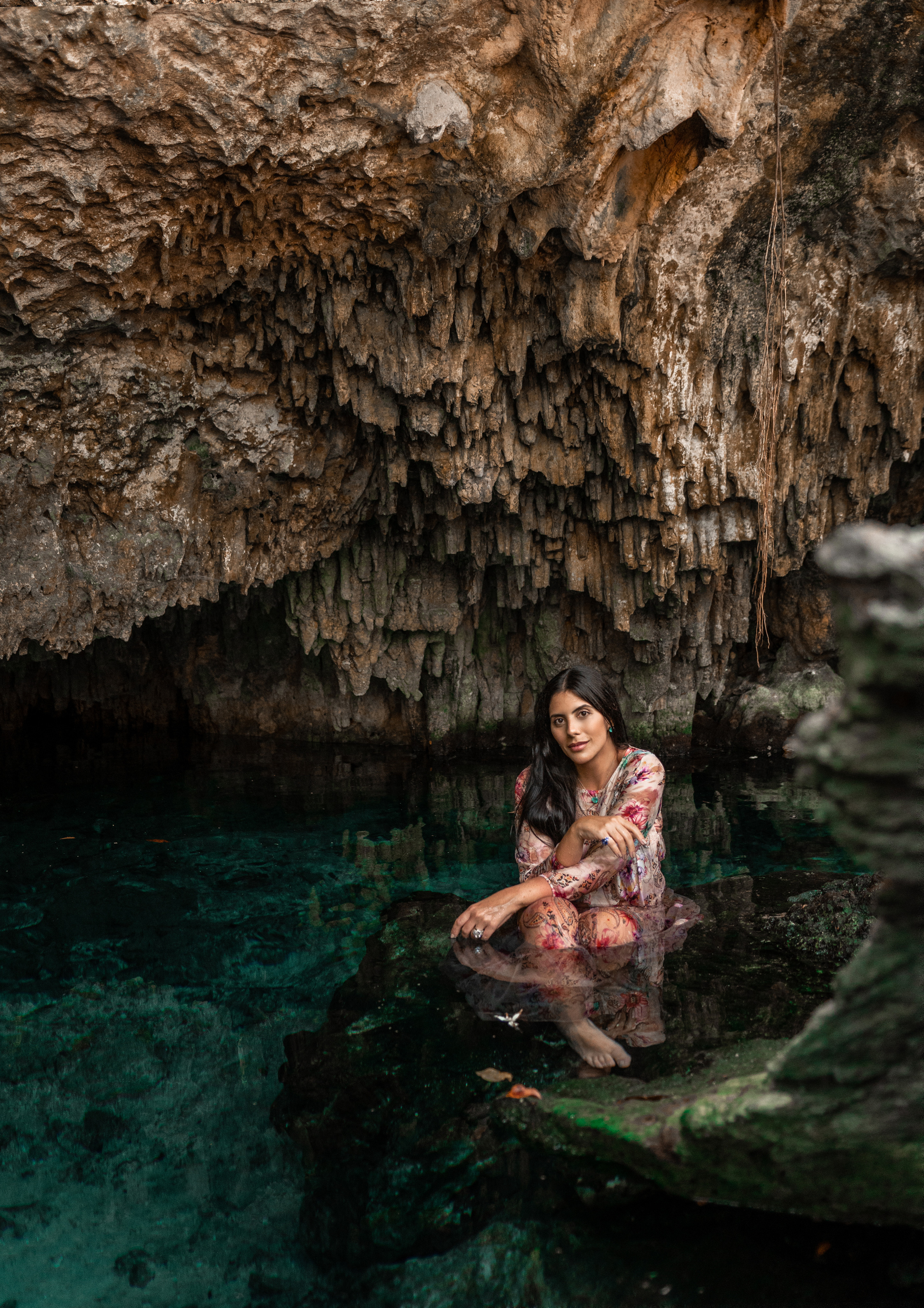 Elegant photoshoot in a natural Mexican cenote