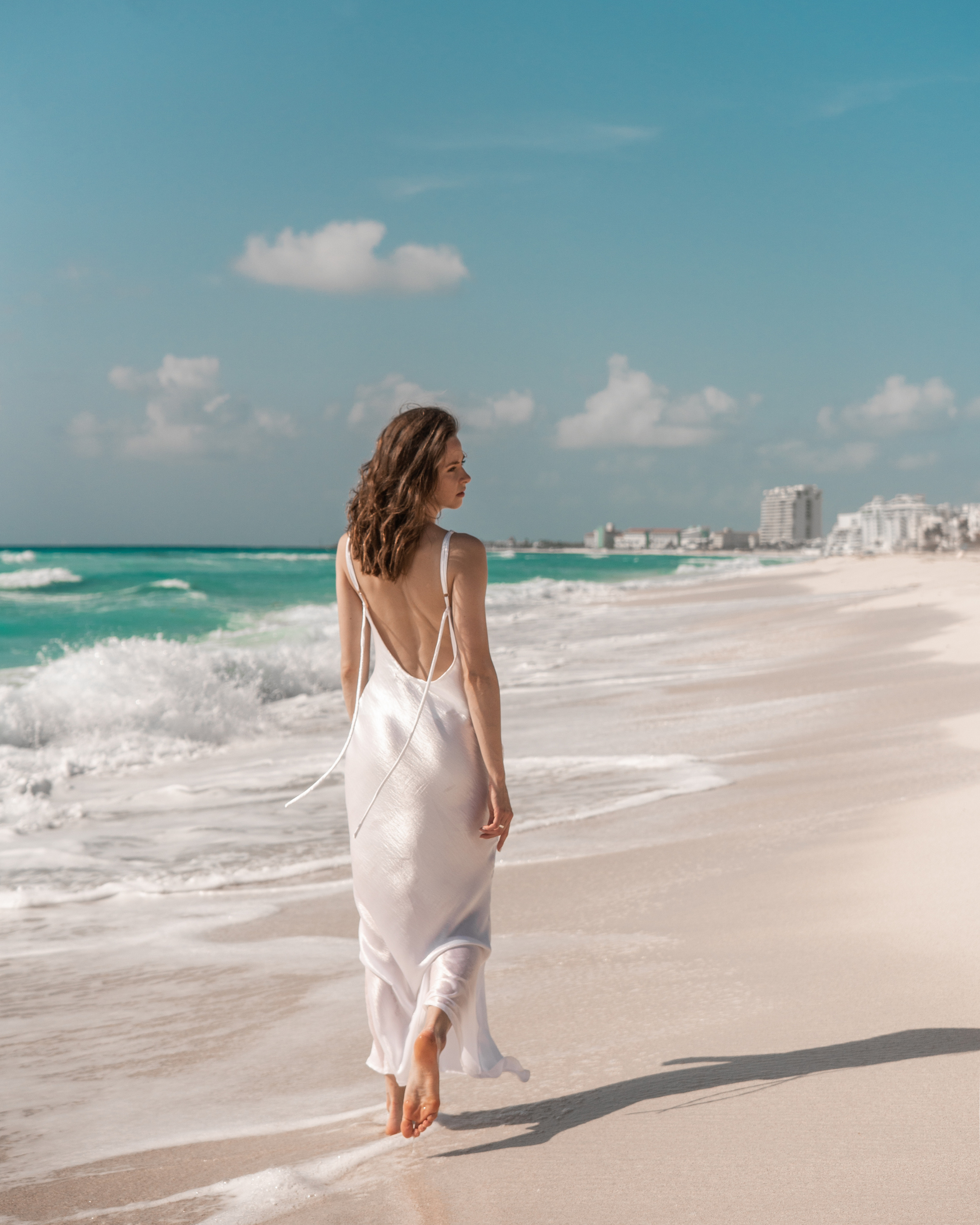 White dress beach photoshoot in Cancun, Mexico