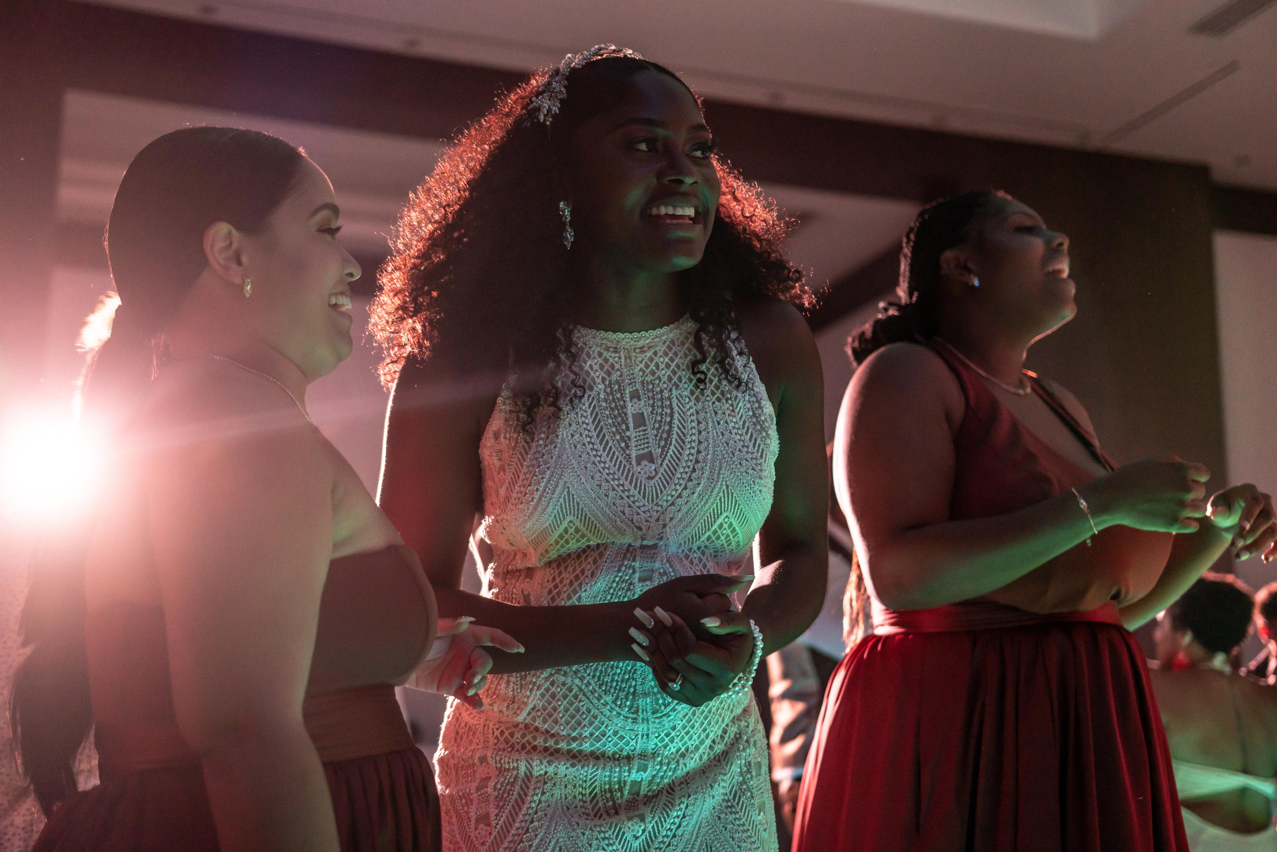 Guests celebrating love at nighttime wedding in Tulum