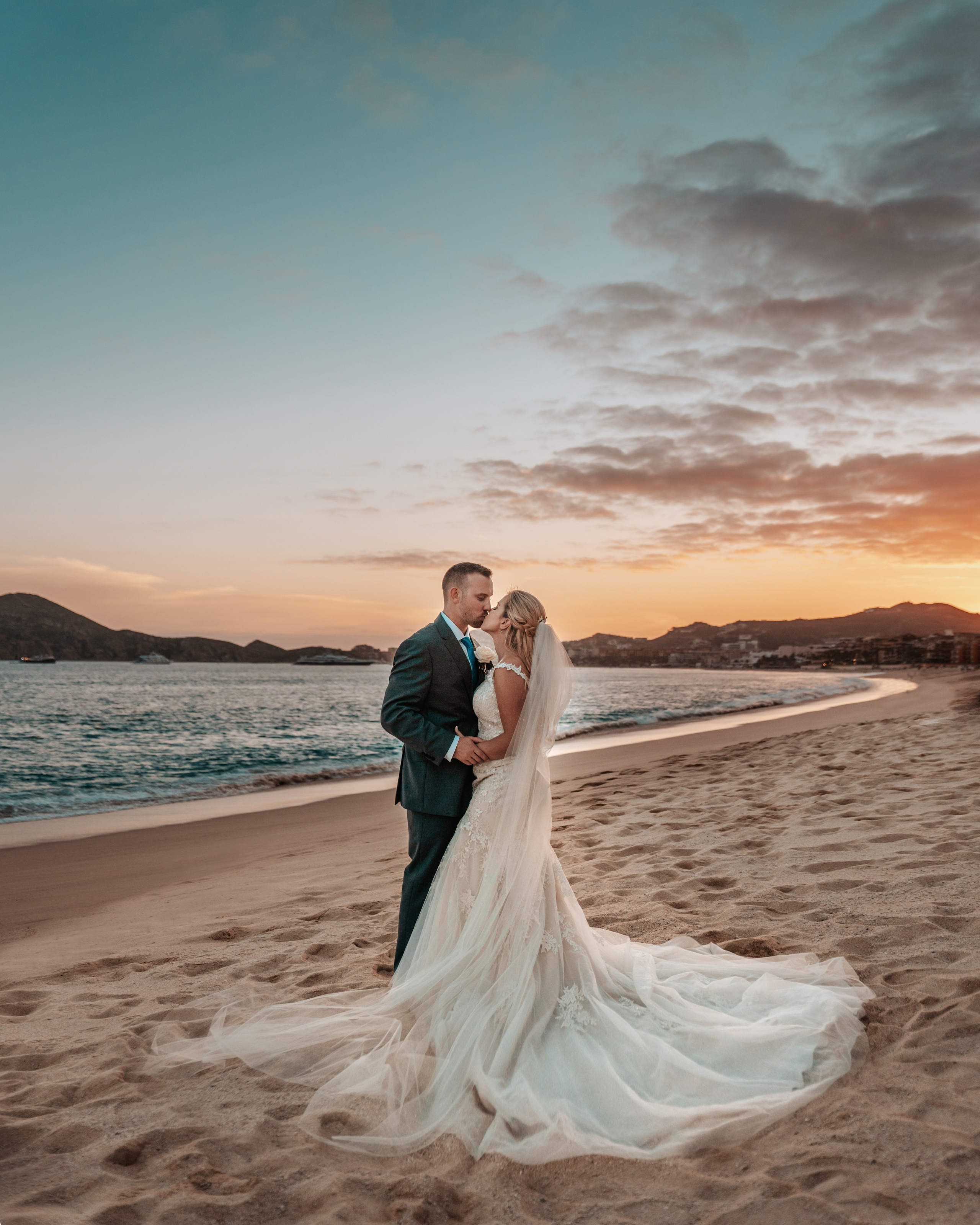 Destination wedding photographer captures couple at Medano Beach, Cabo