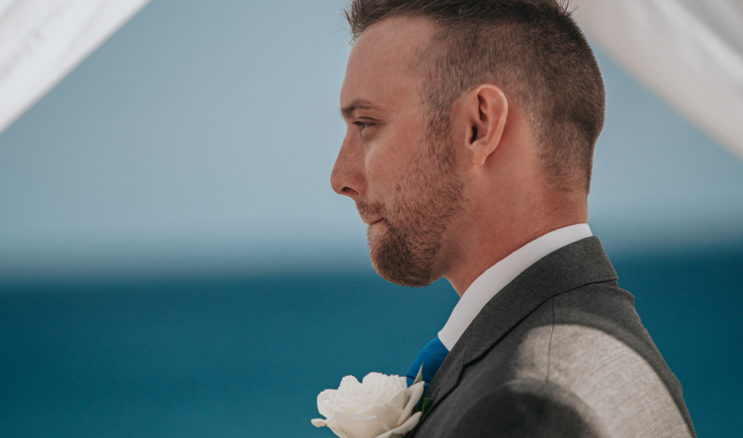 Emotional wedding vows captured at coastal ceremony