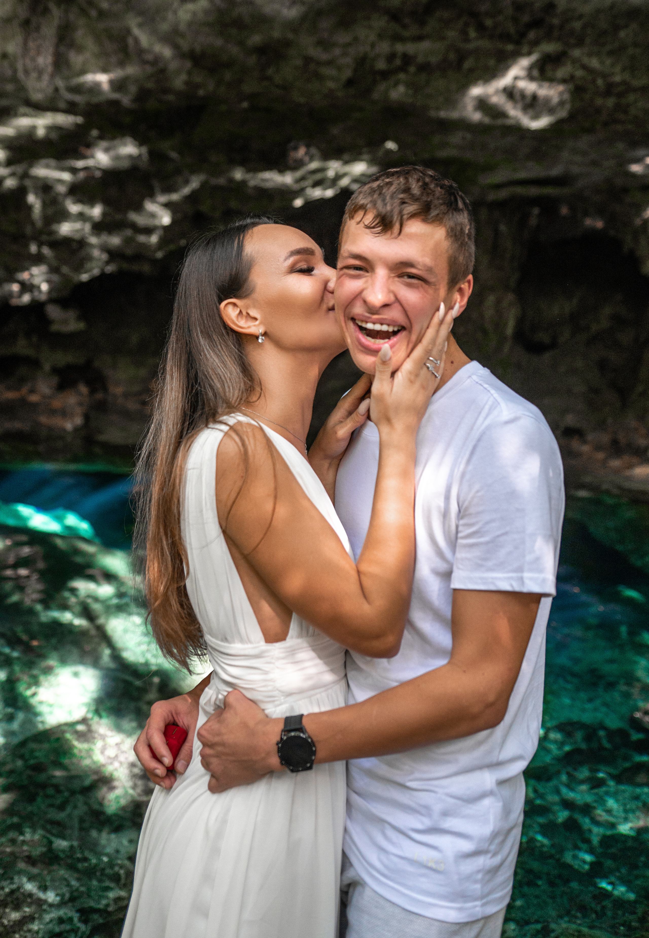 Engagement ring moment in tropical cenote setting