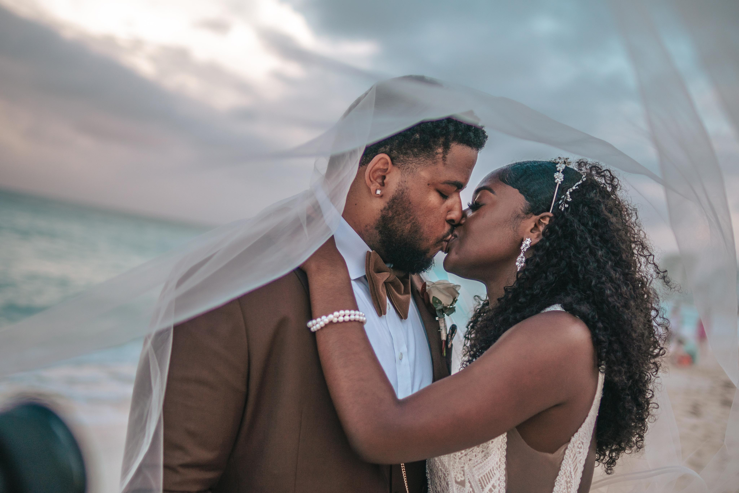 Overcast beach wedding – professional photos by Victoria Liskova