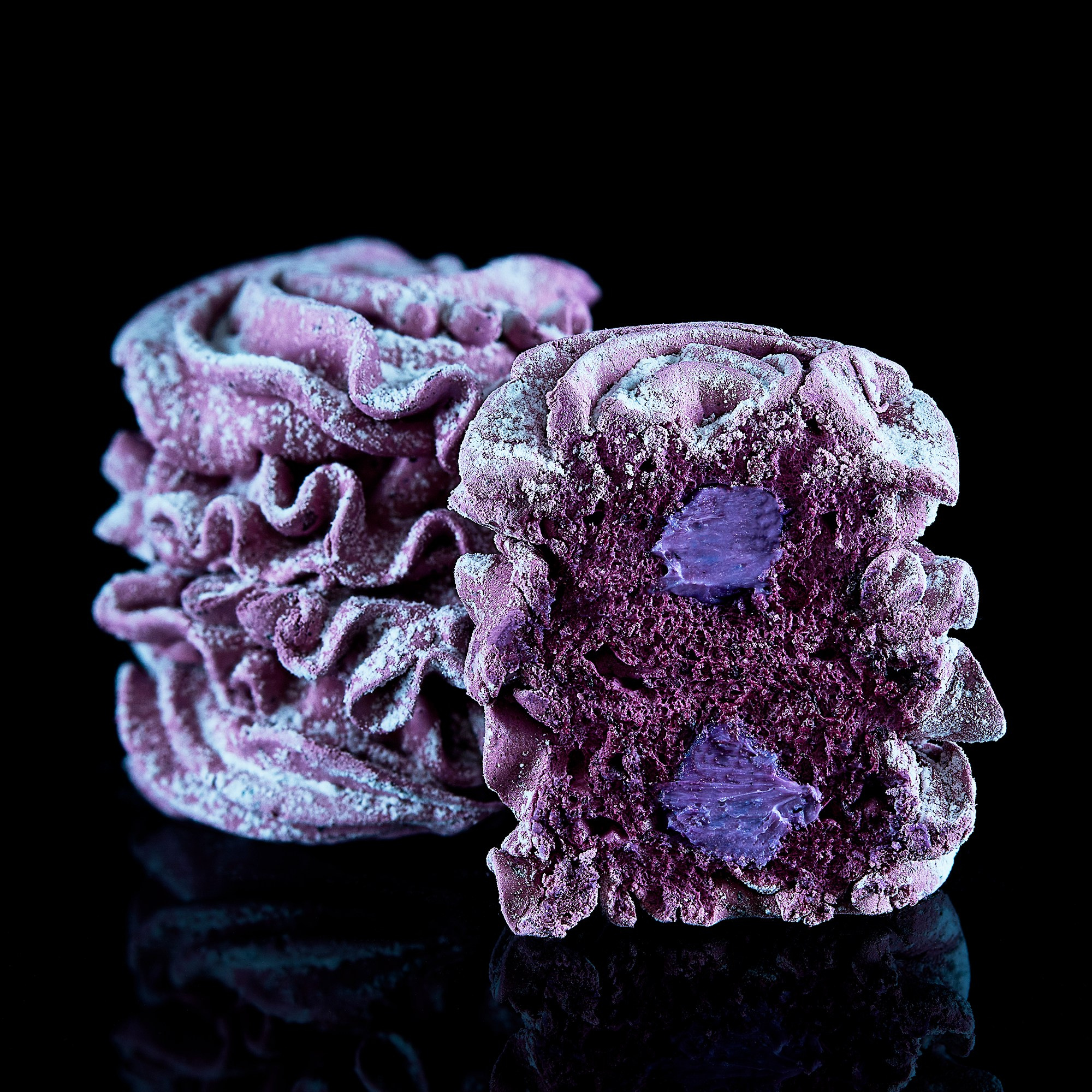 Photographer Roman Djuzev - Sliced ​​Marshmallow on Black Background with Reflection.