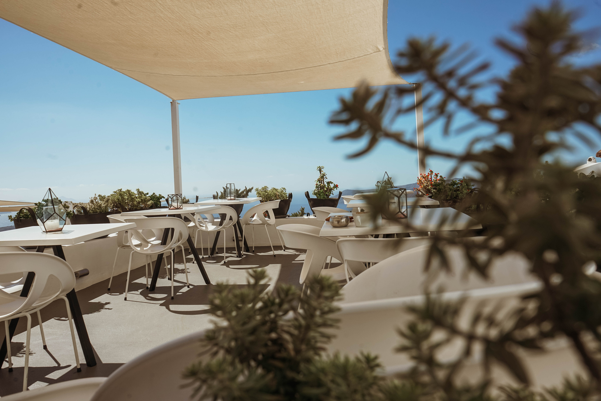 cozy cafe in santorini with a stunning view