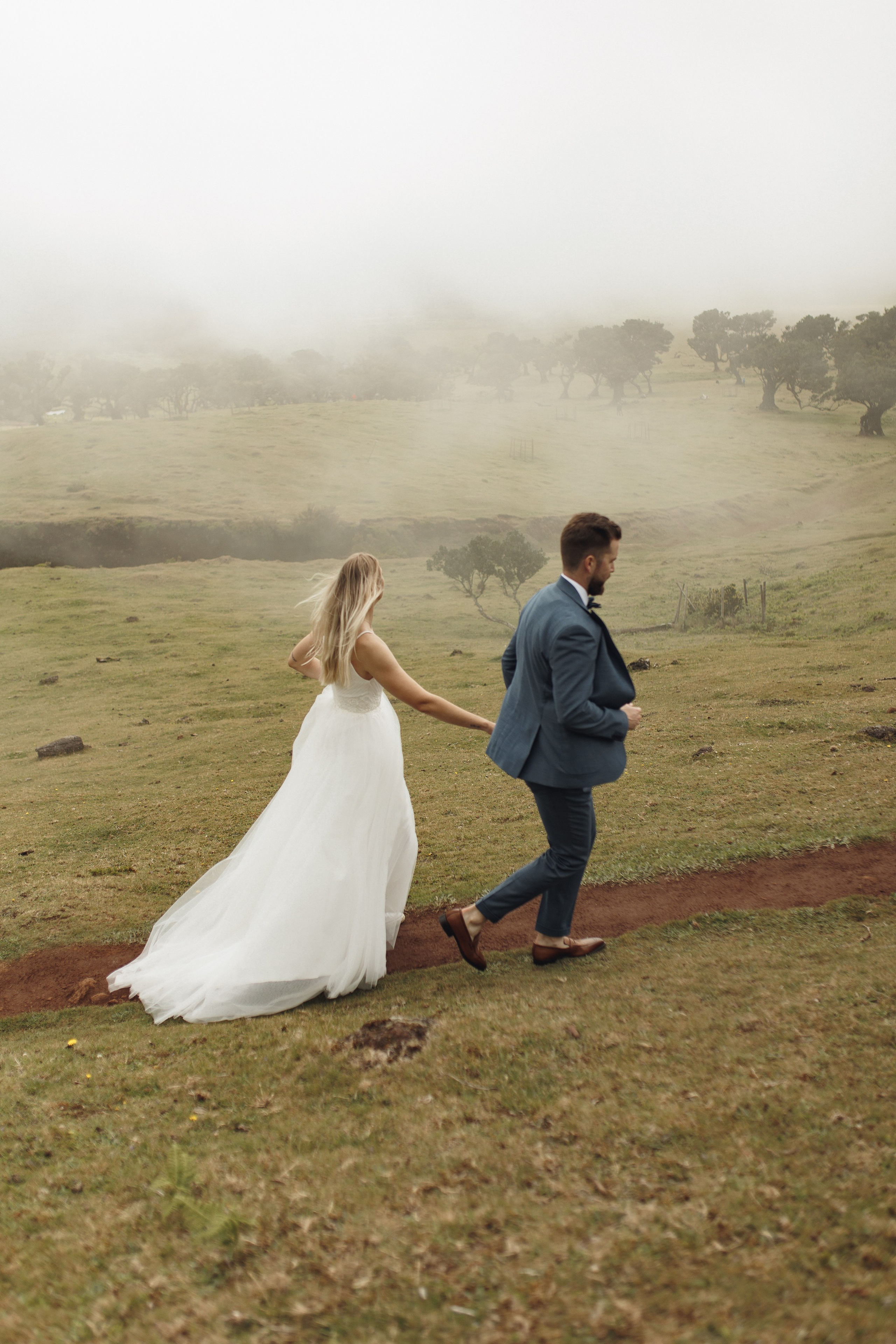 Couple tying the knot under the mystical trees of Fanal Forest Madeira