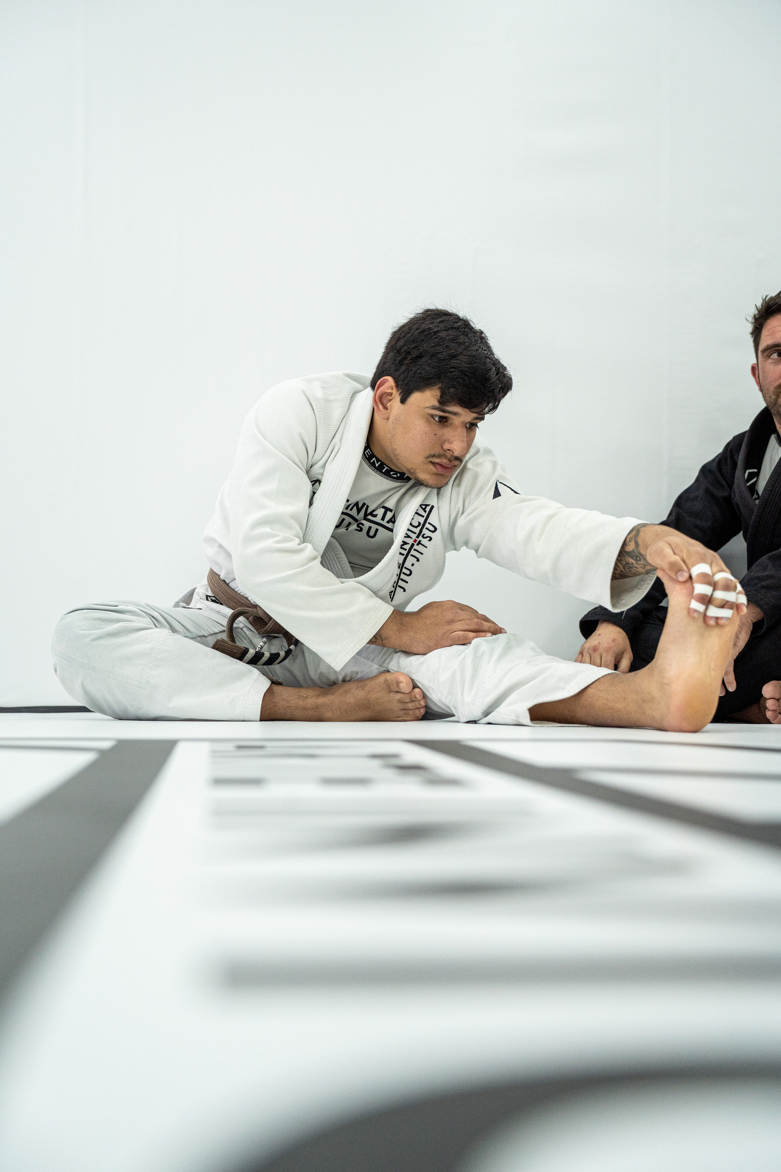 Arte Invicta — Graduação de Faixa. Frames by Giovani Braga