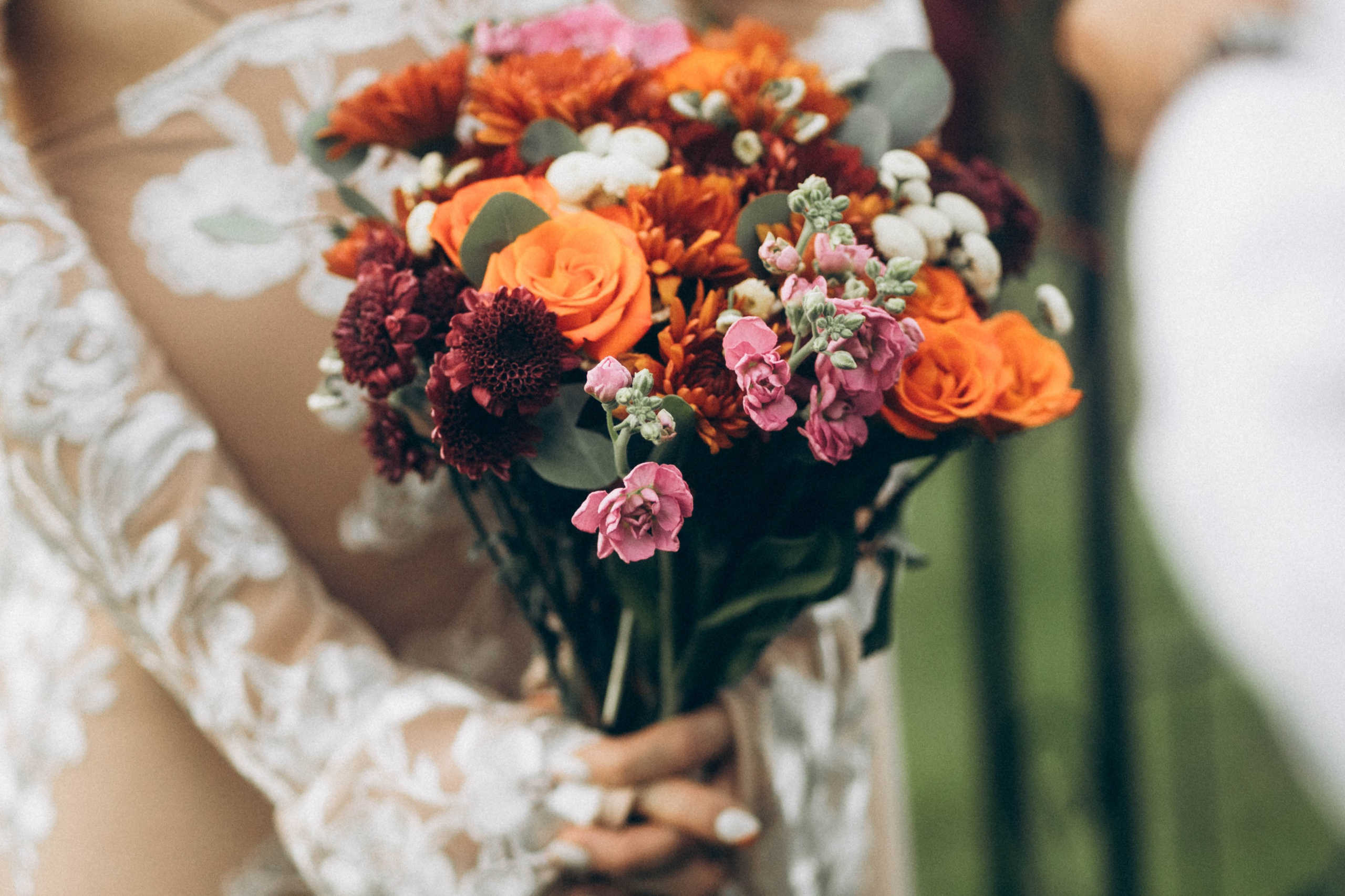 Fine art wedding photography capturing bride with bouquet in romantic editorial style