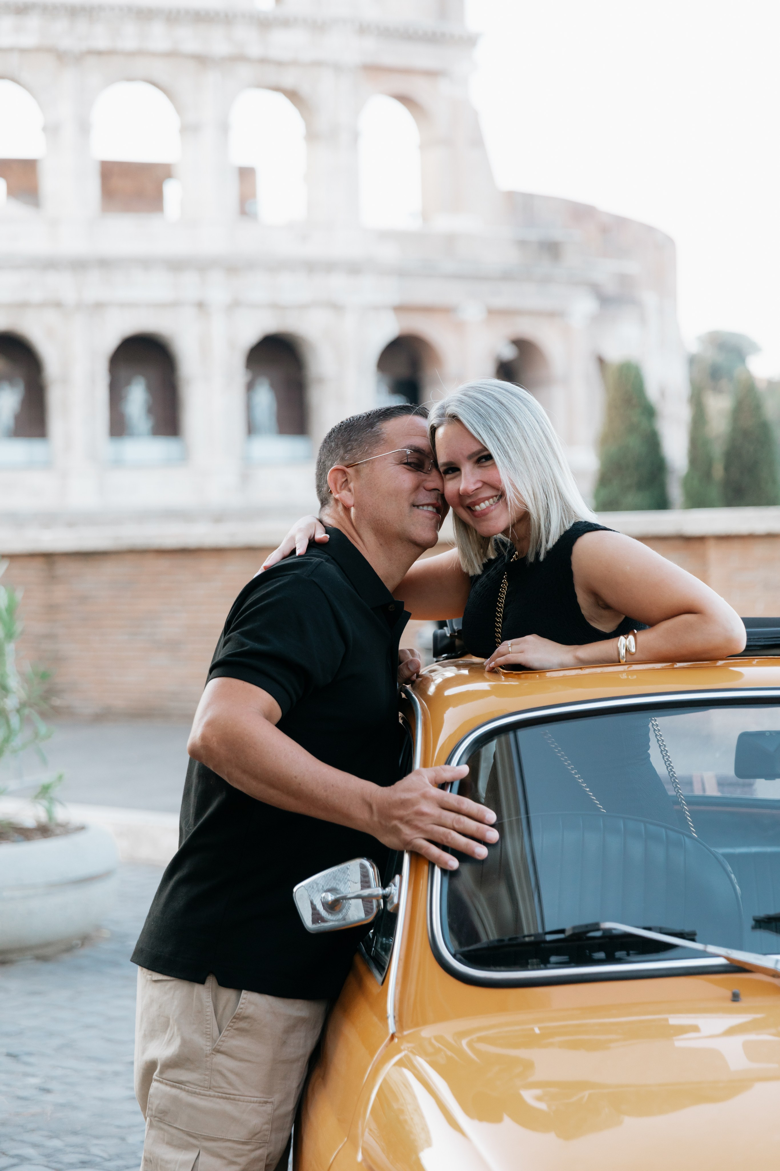 Fiat 500 and Vespa. Photographer in Rome
