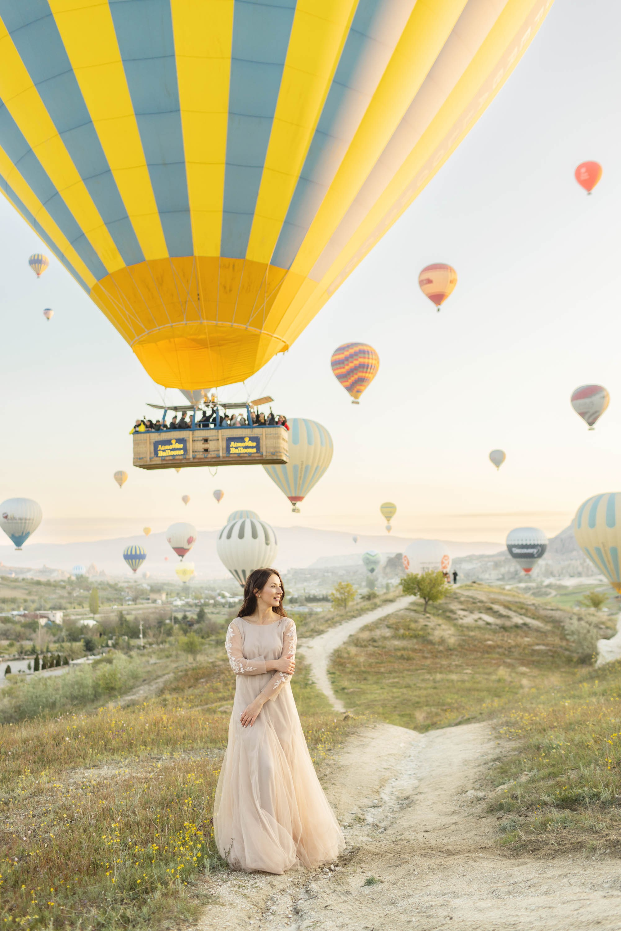 Magical Wedding Photoshoot in Cappadocia: Balloons, Caves, and Valleys. Julia Ganch I Fashion Wedding Photography I Cappadocia Turkey