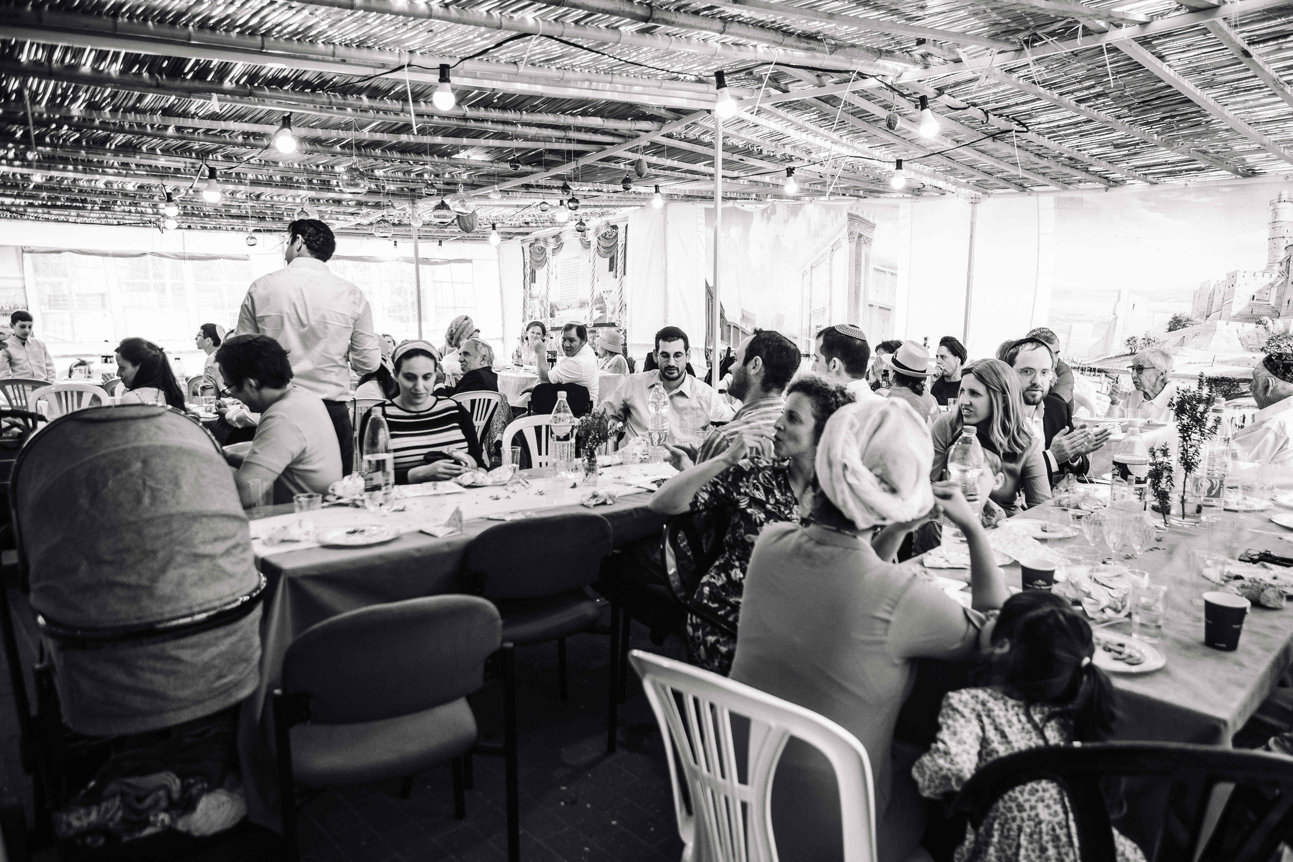 BRITH MILA IN THE SMALL SYNAGOGUE. PHOTOGRAPHER IN ISRAEL