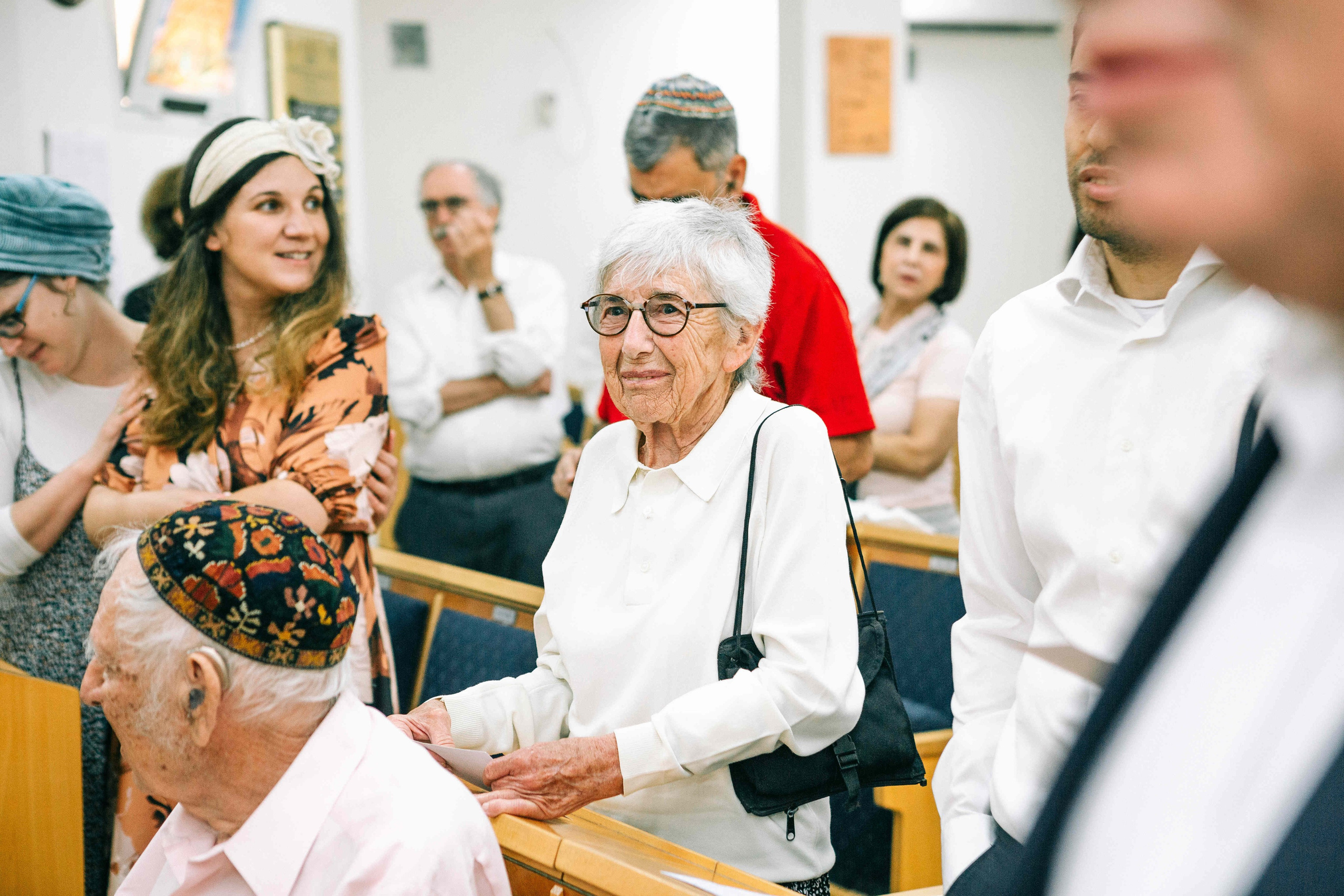 BRITH MILA IN THE SMALL SYNAGOGUE. PHOTOGRAPHER IN ISRAEL