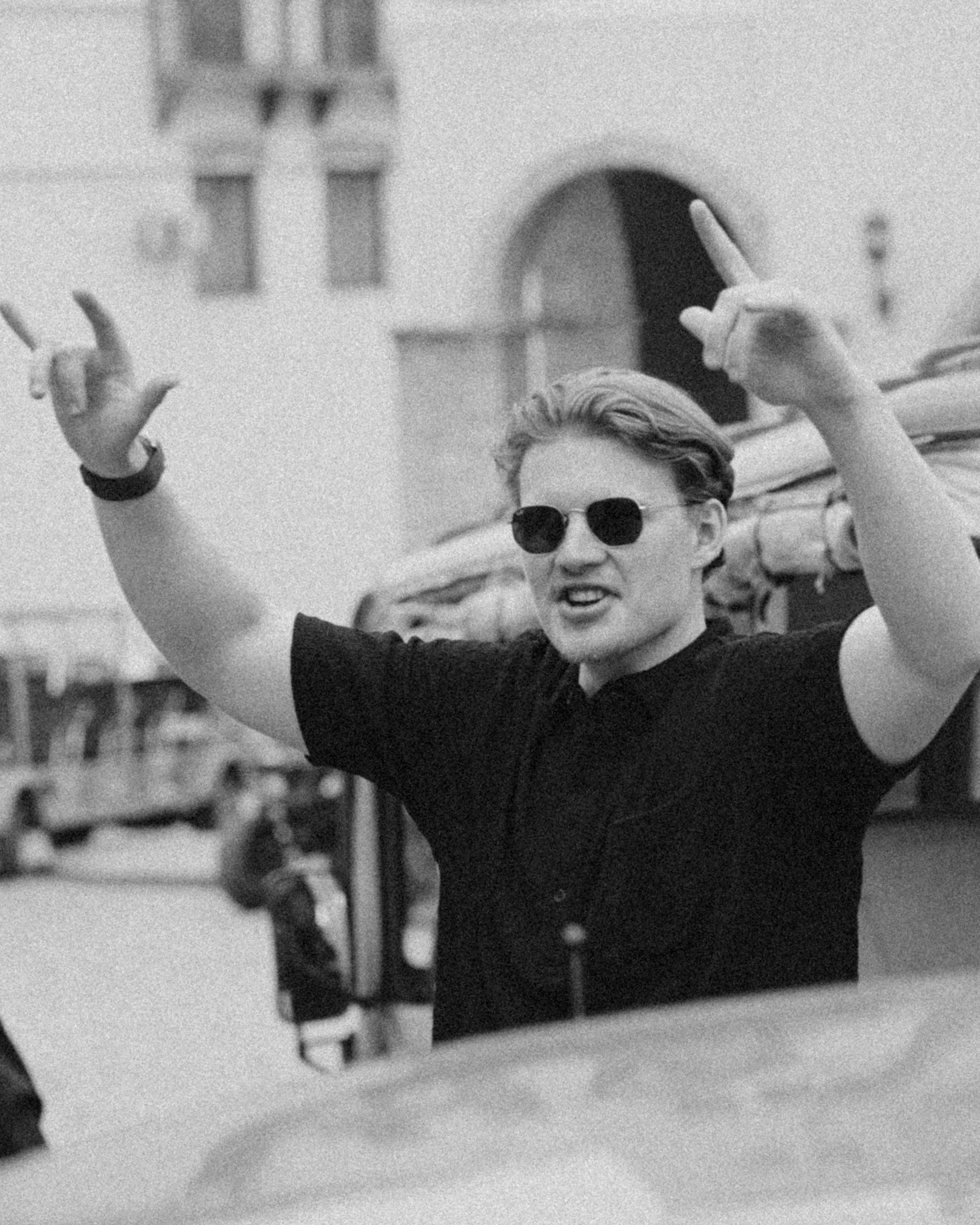 Groom friend celebrating during wedding