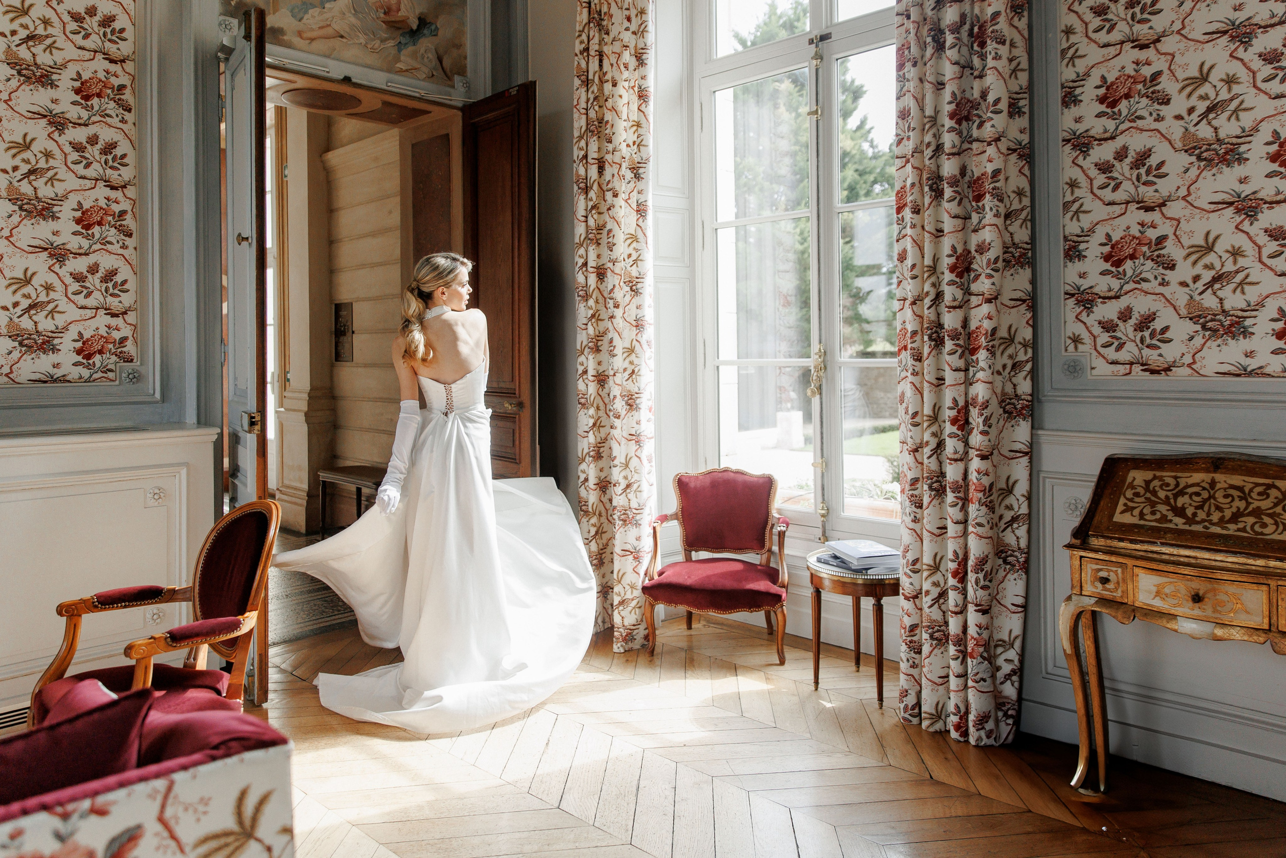 Stunning bridal portrait in France, showcasing elegant wedding dress. 