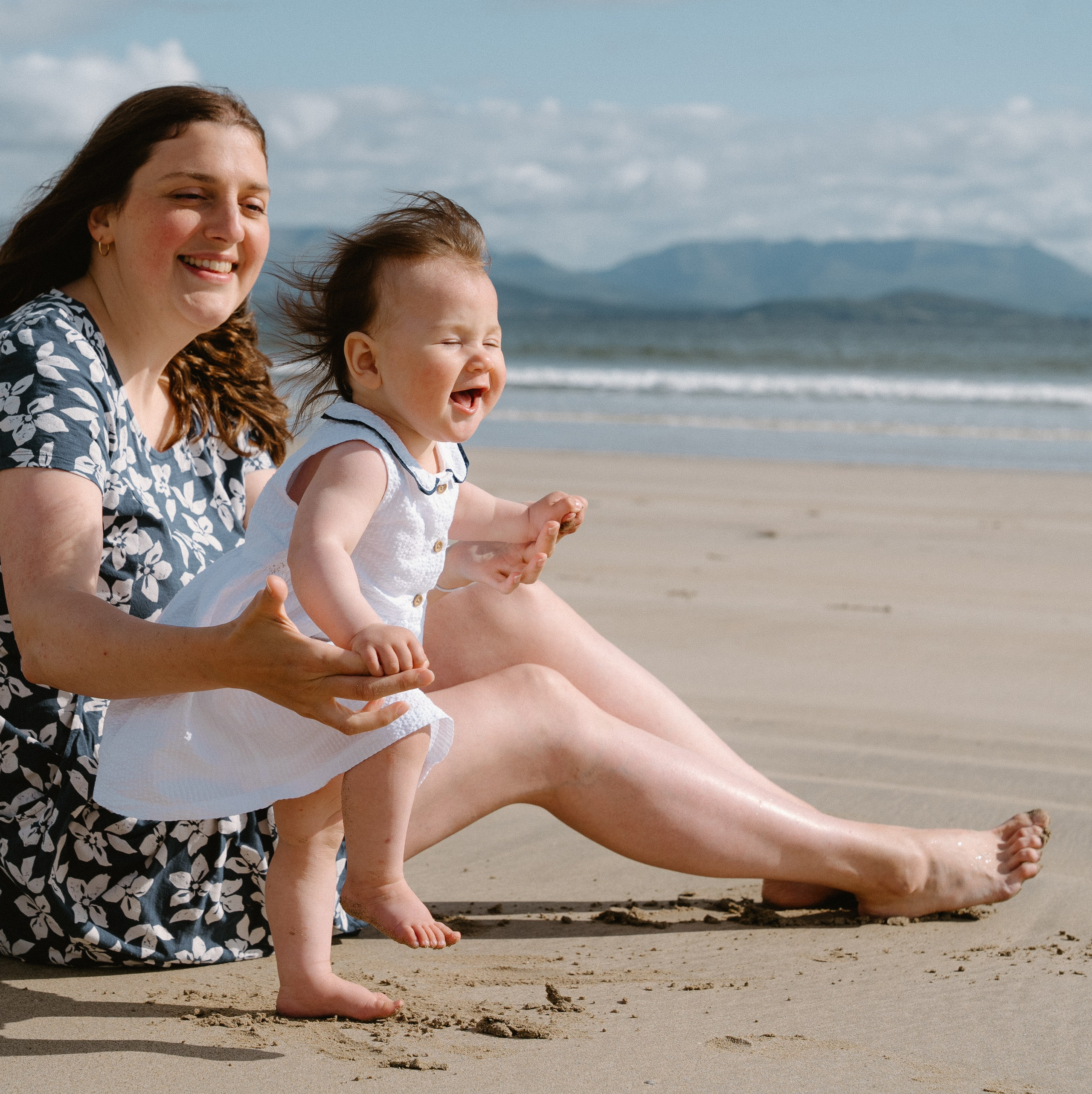 Darya and Mia at the ocean. Wedding and family photographer Ireland