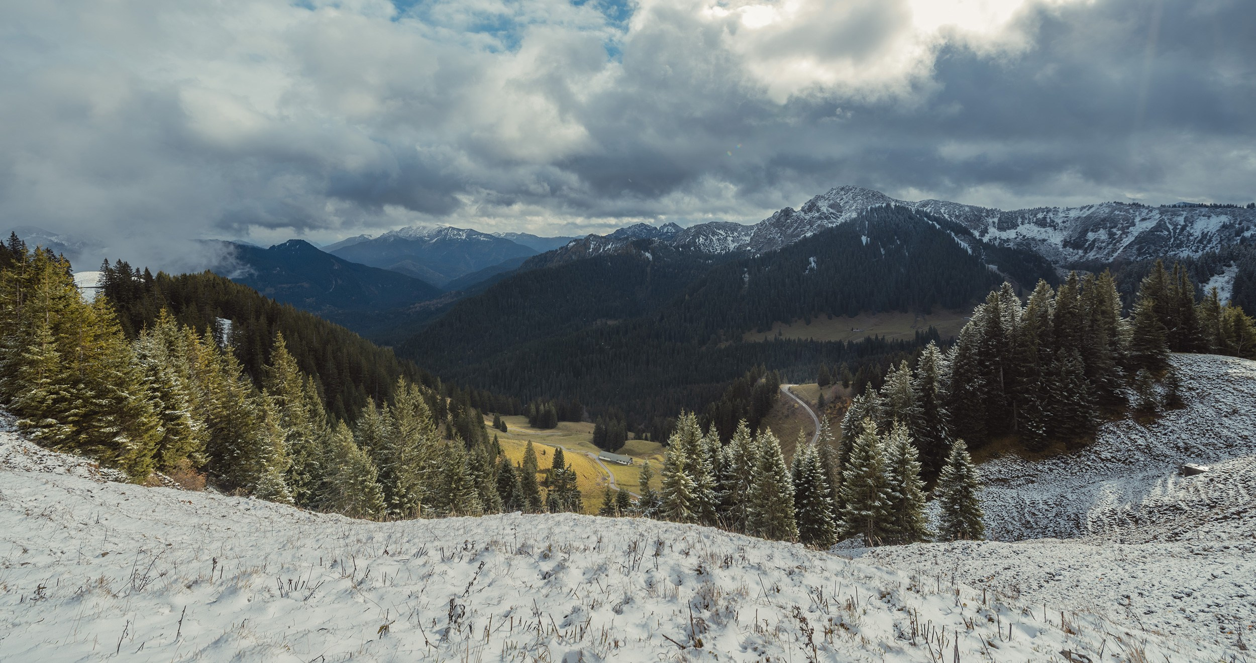 Mountain hills and spruce trees dusted with the first snow, Wallberg.