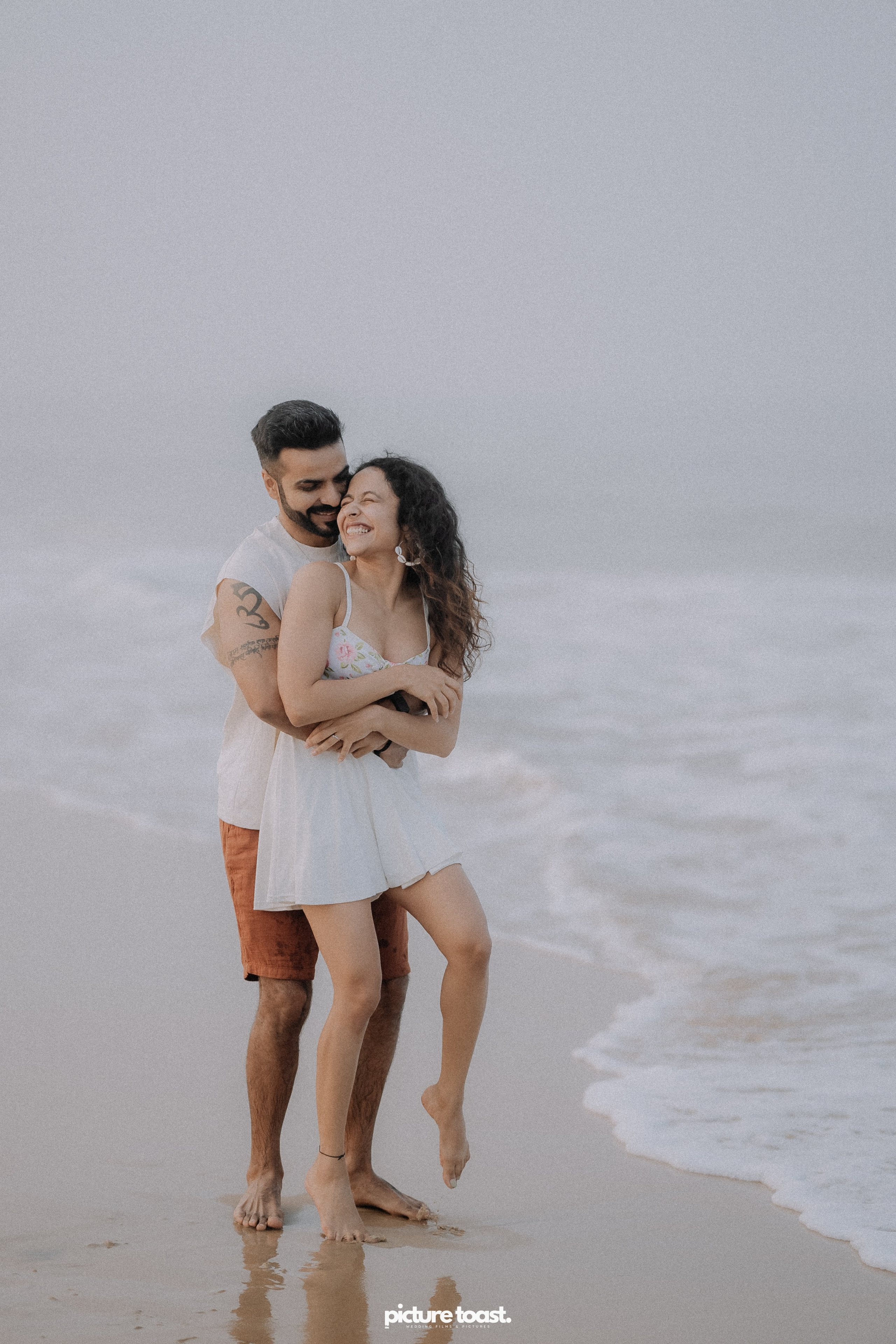 Love In The Beach. Fine art Wedding Photographers in India & Canada