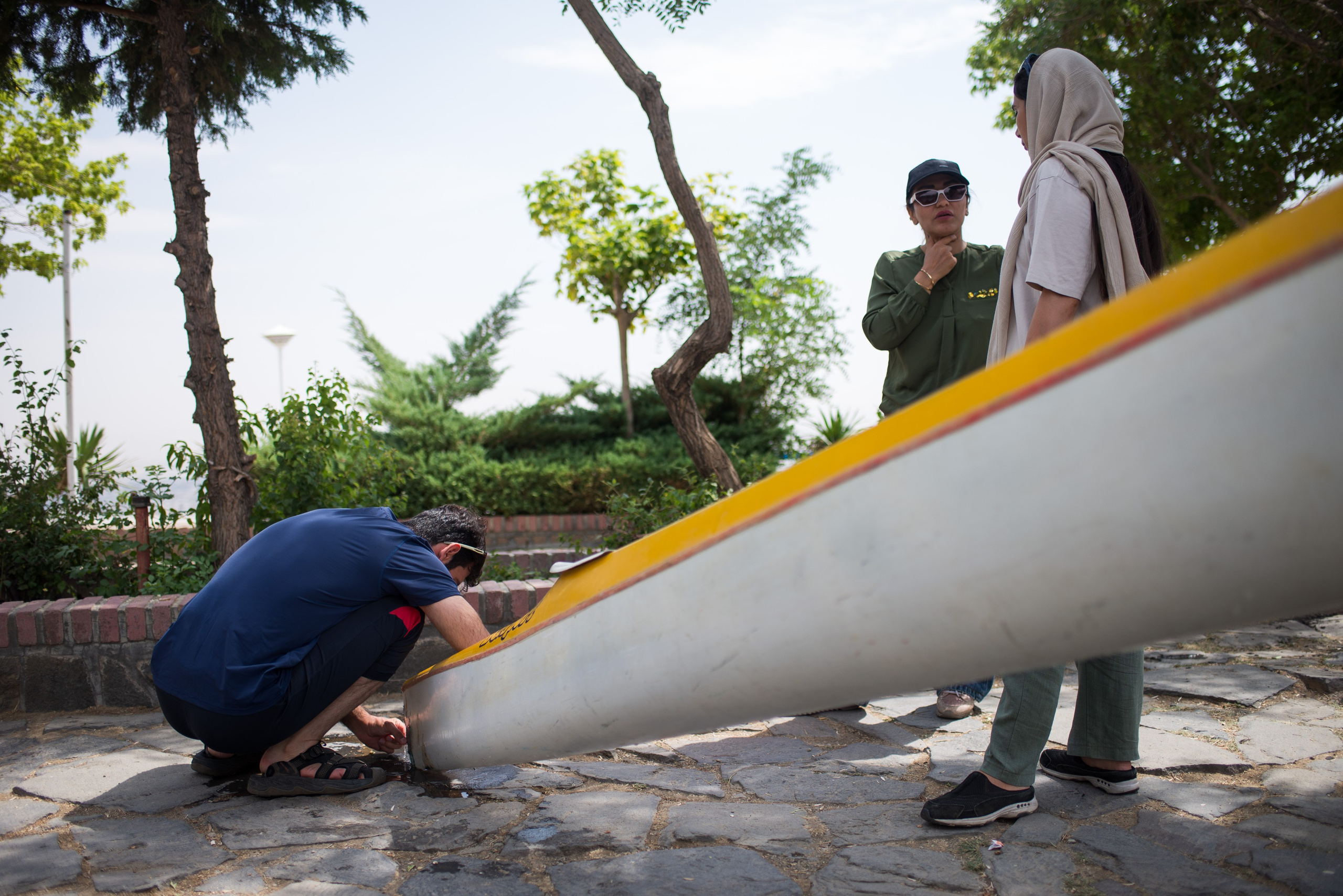 The team’s coach is also responsible for part of the maintenance and repair of the kayaks.