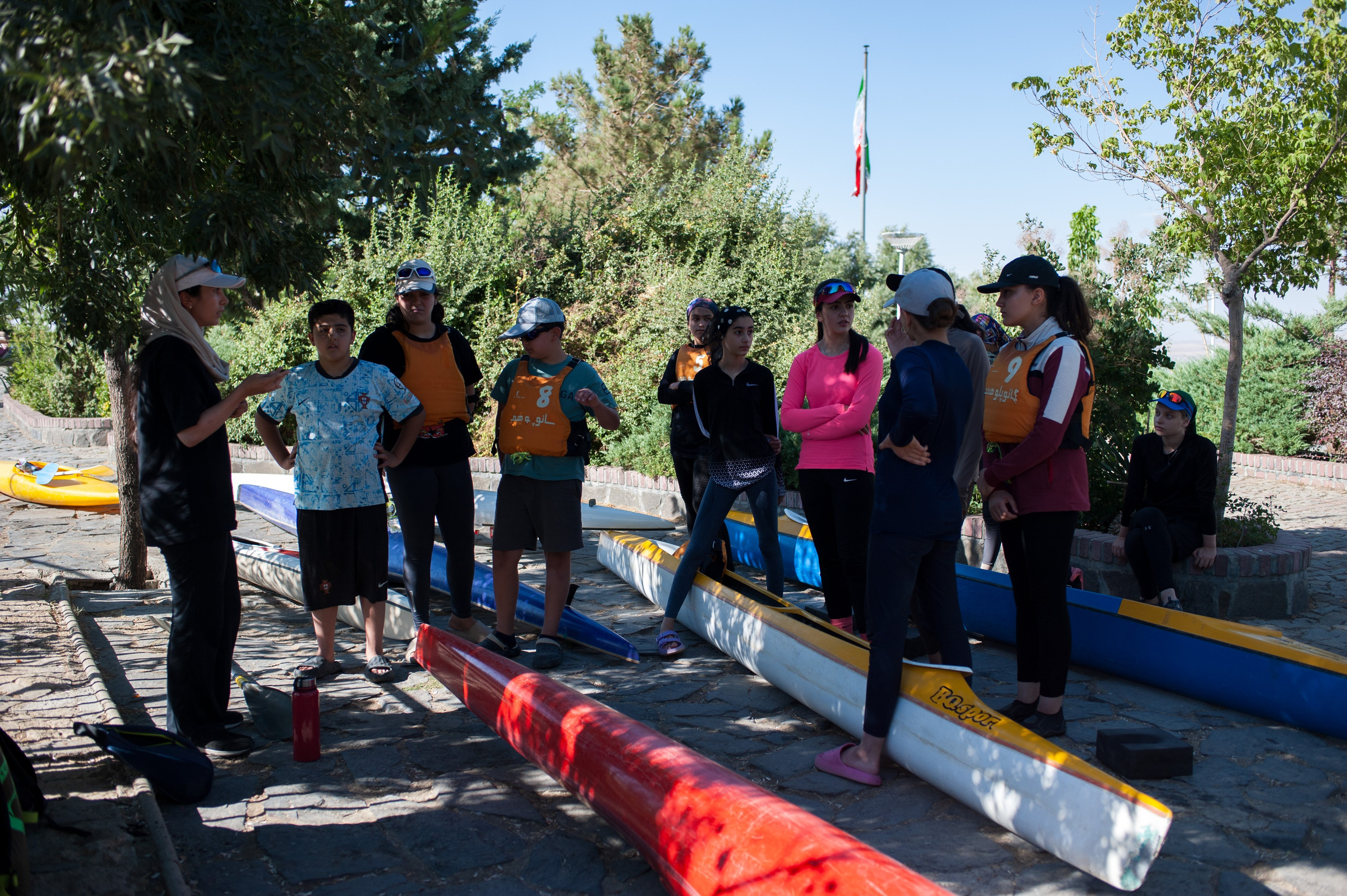 Matineh Nouri, coach of the girls’ team, gives instructions to the athletes before training and their departure for the national team talent identification camp.