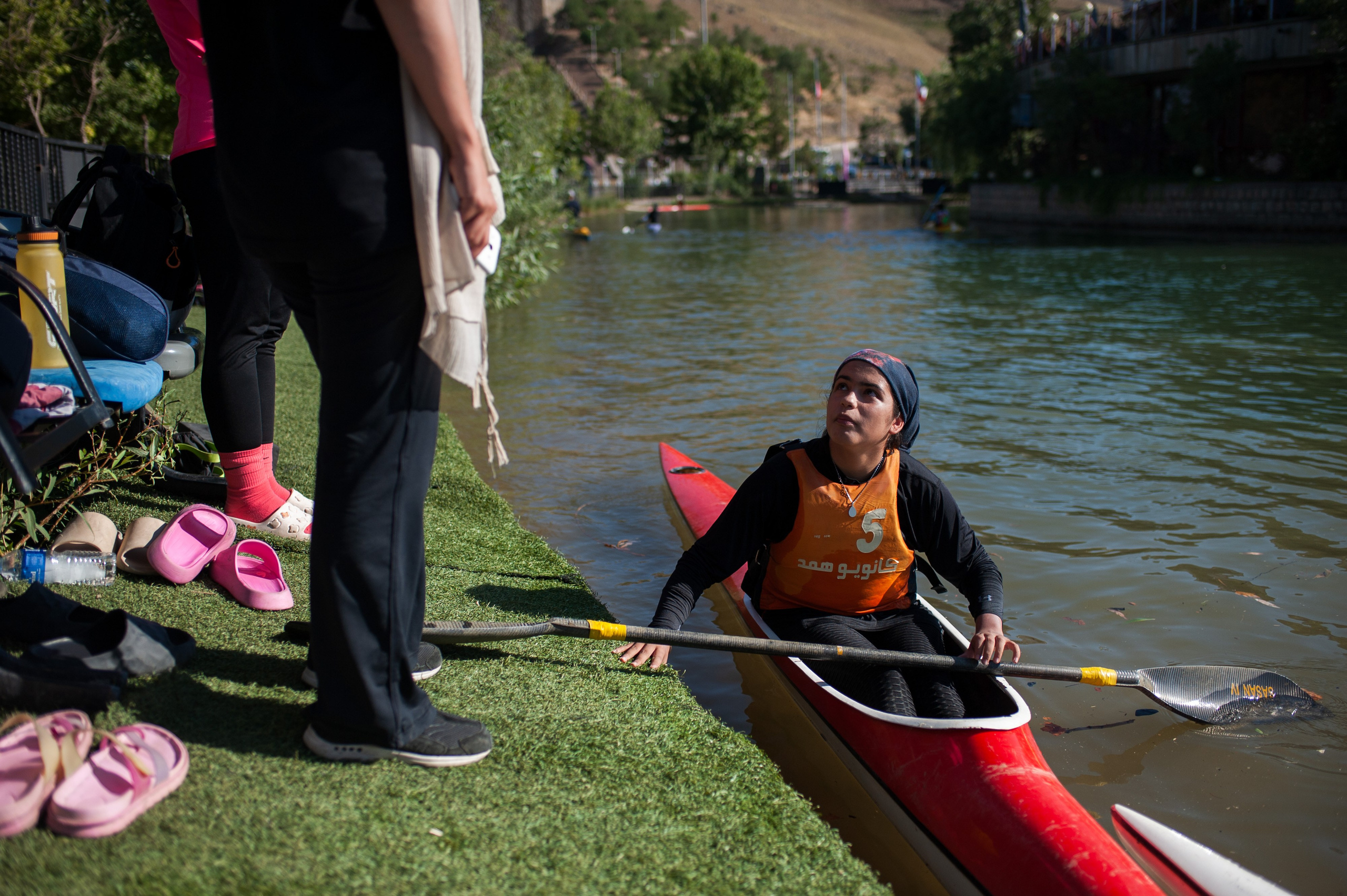 Amitida receives instructions from her coach during training.
