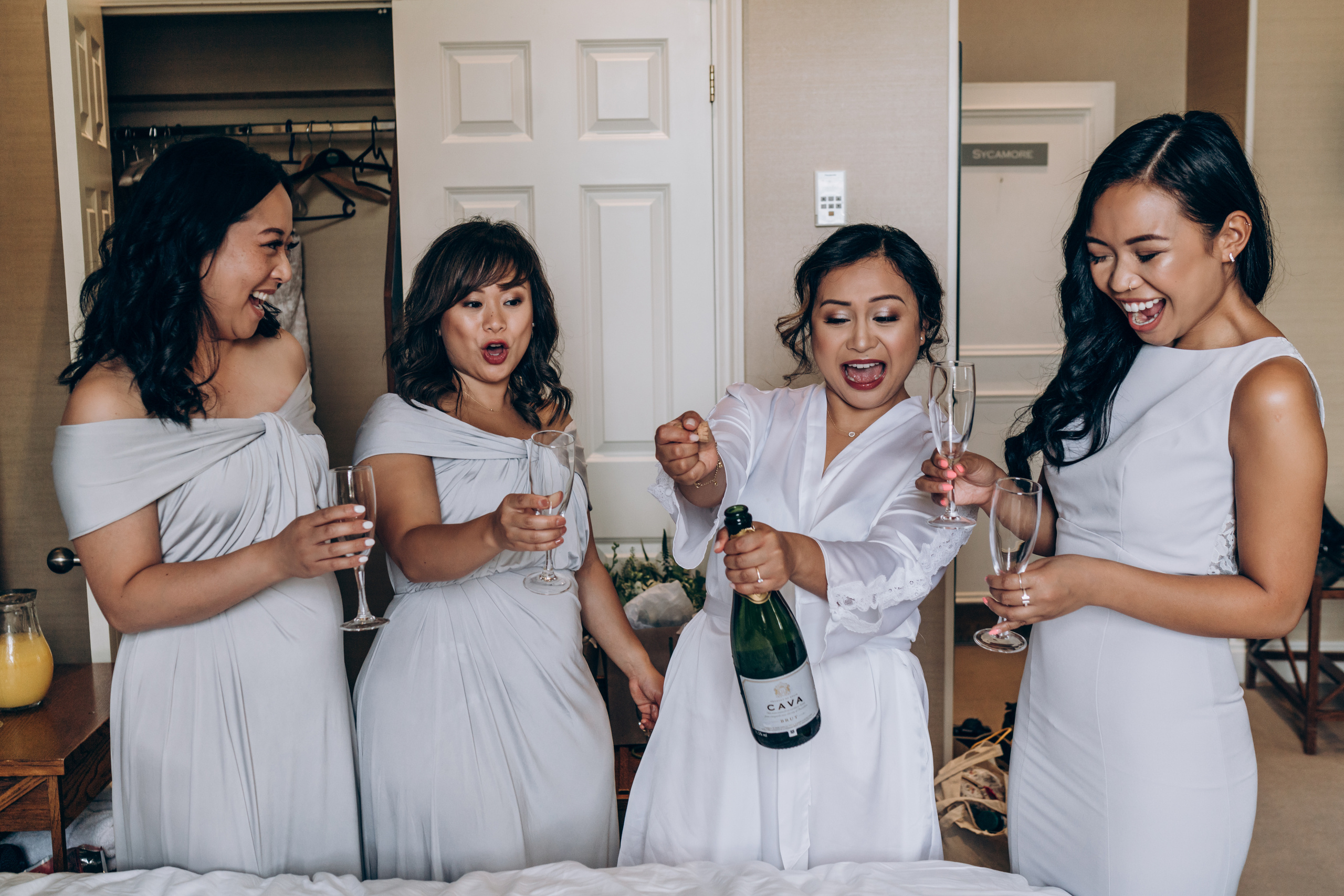 bridal party is drinking sparkling vine 
