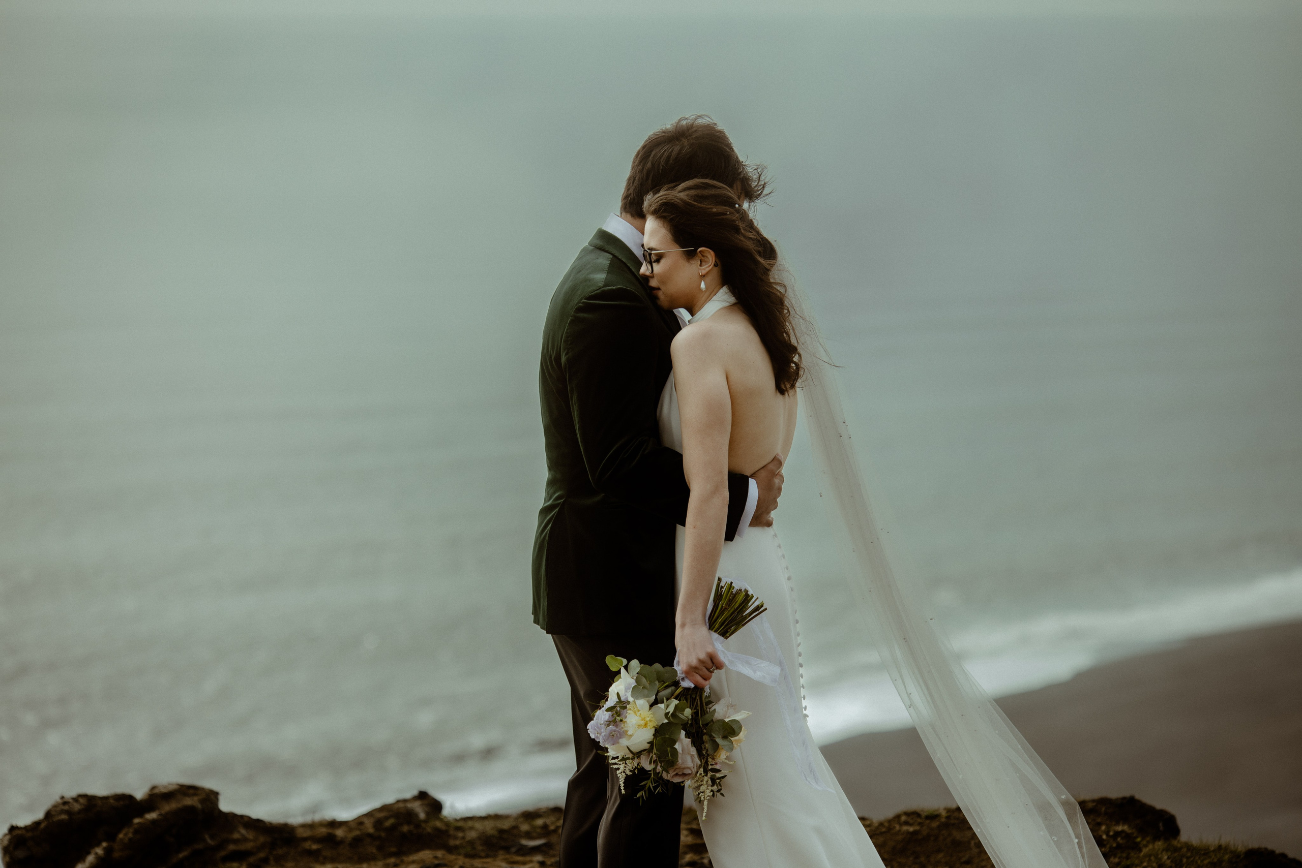 Iceland elopement at endless black sand beach. Iceland elopement photographer & videographer