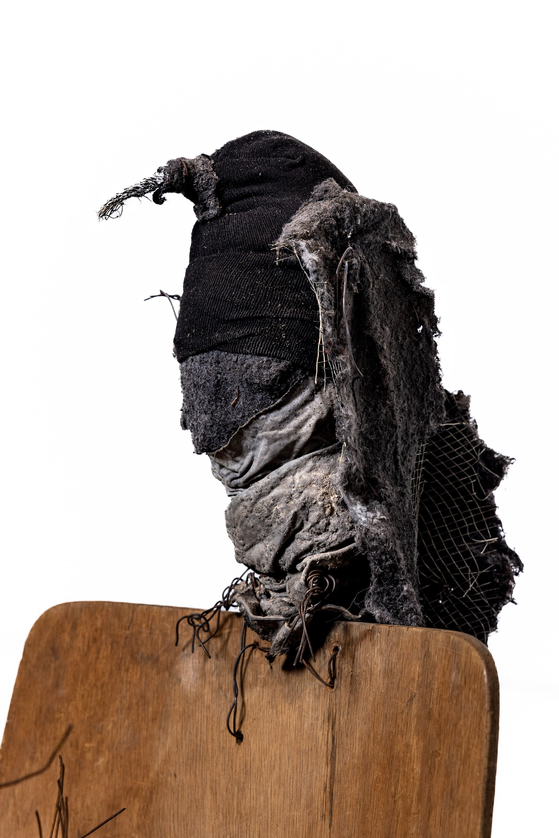 Bird and rusted flowers on chair, 2024. Haim Sokol’s artists website