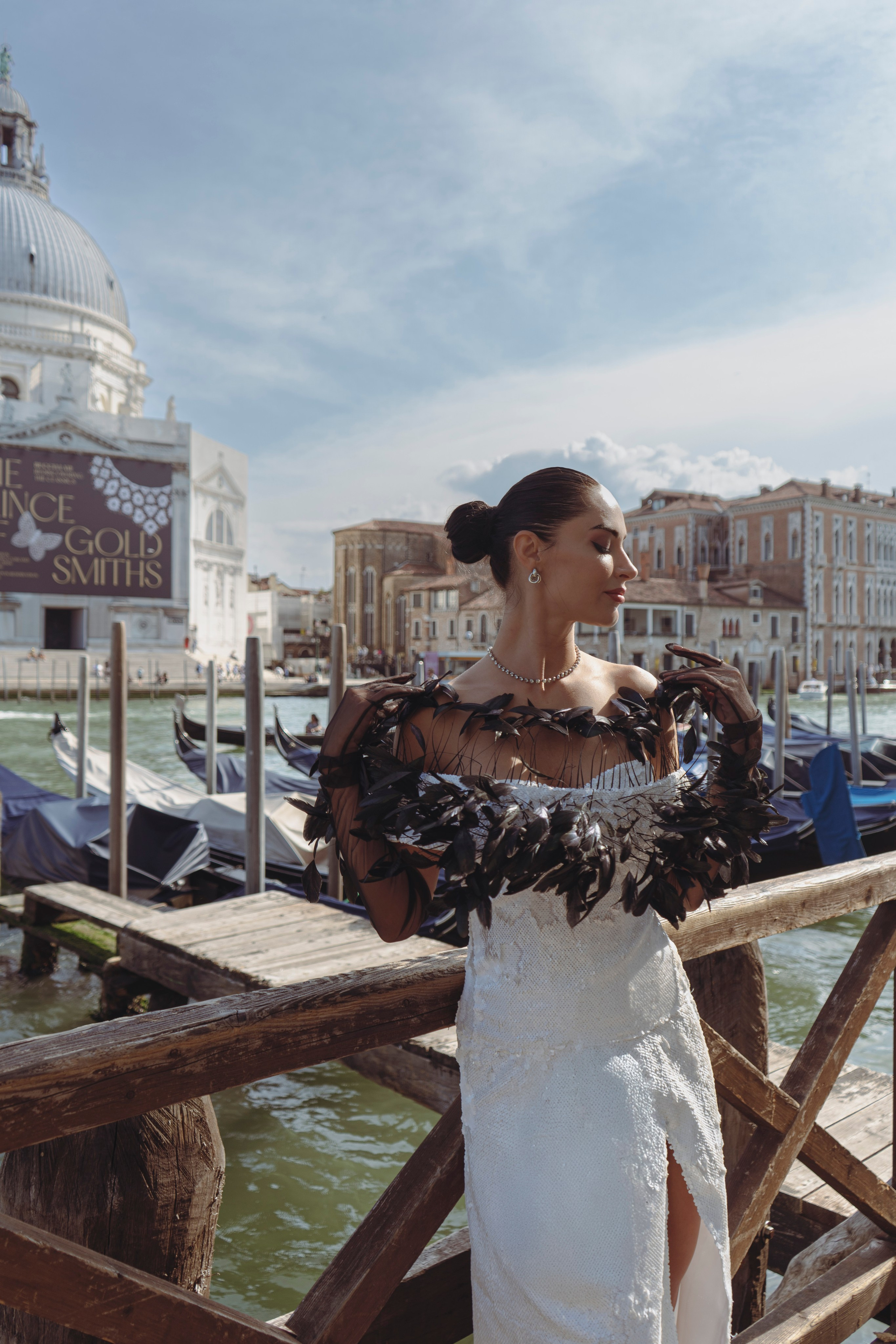 Fashion shoot in Venice with elegant Italian styling and gondolas in the background.