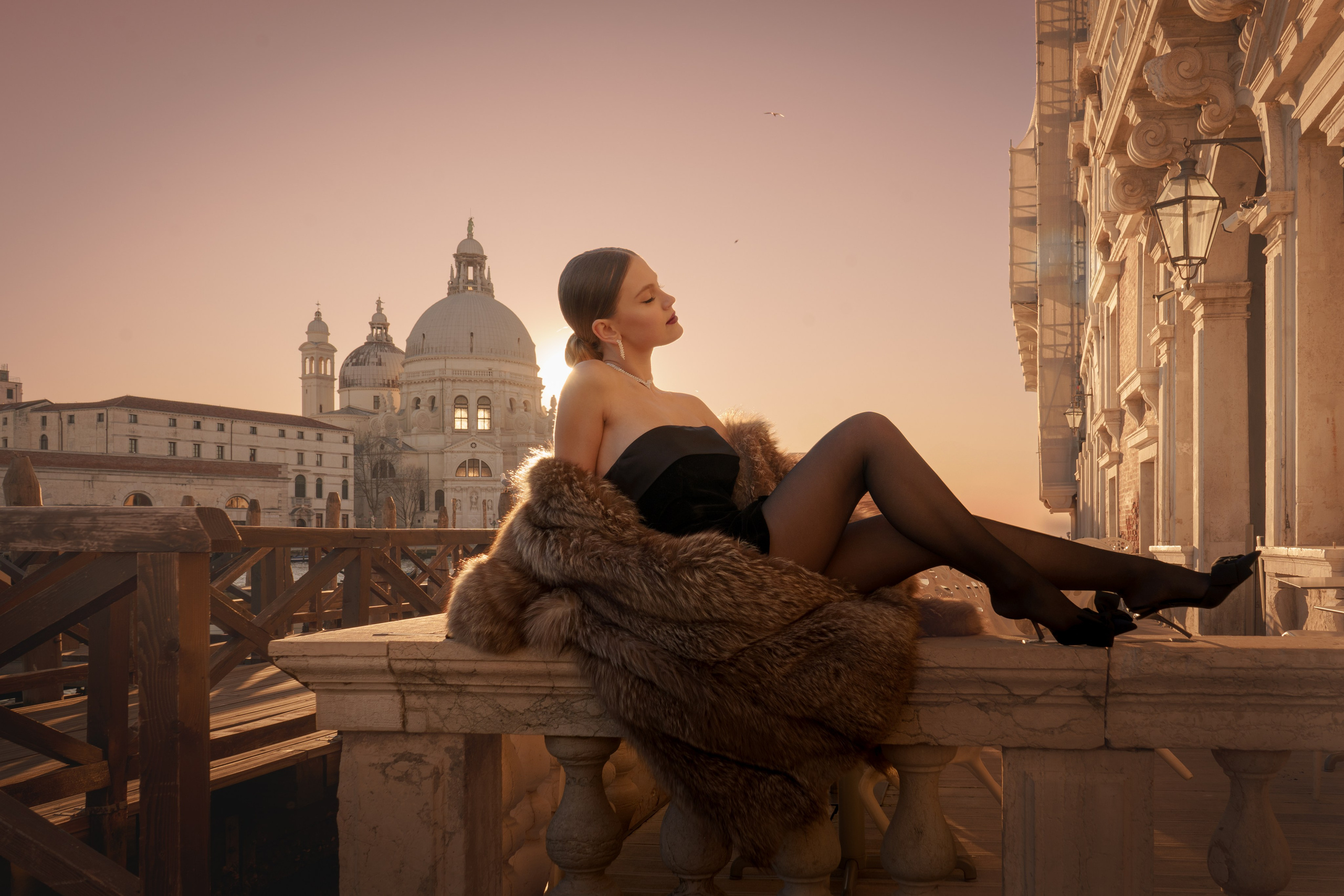 Branding photoshoot Venice for blogger in silk dress near Grand Canal