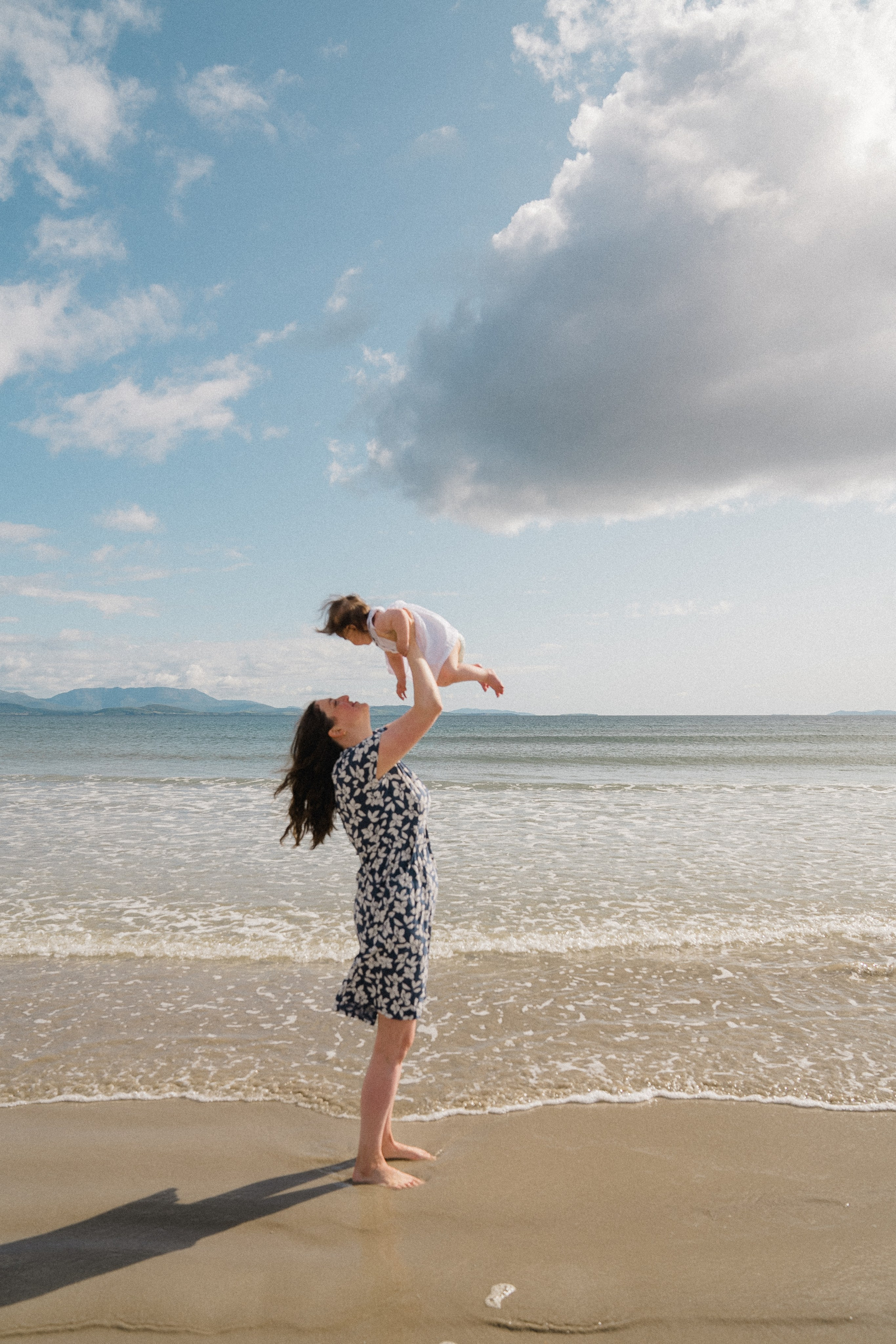 Darya and Mia at the ocean. Wedding and family photographer Ireland