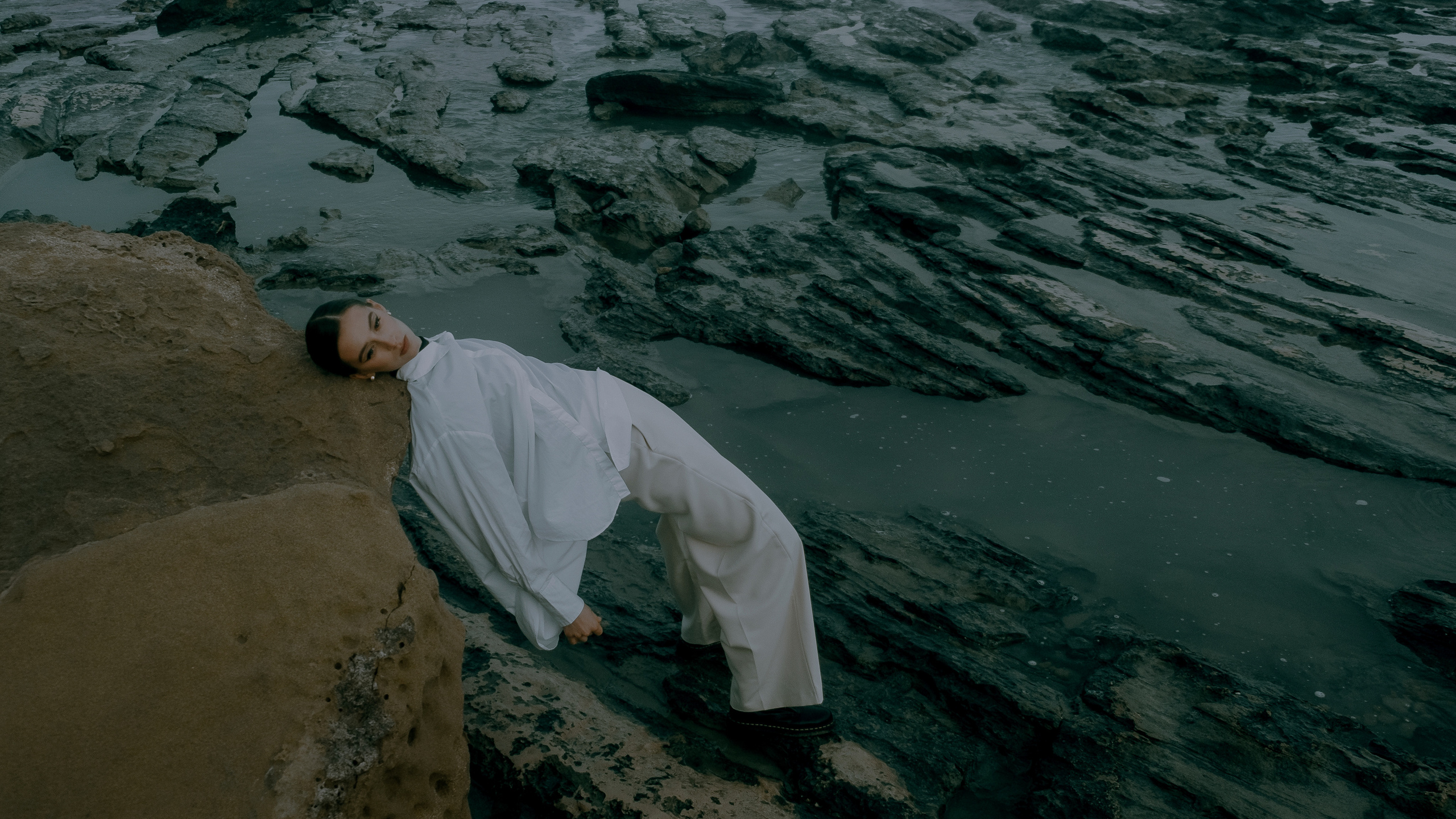 Atmospheric stylized photo shoot by the sea
