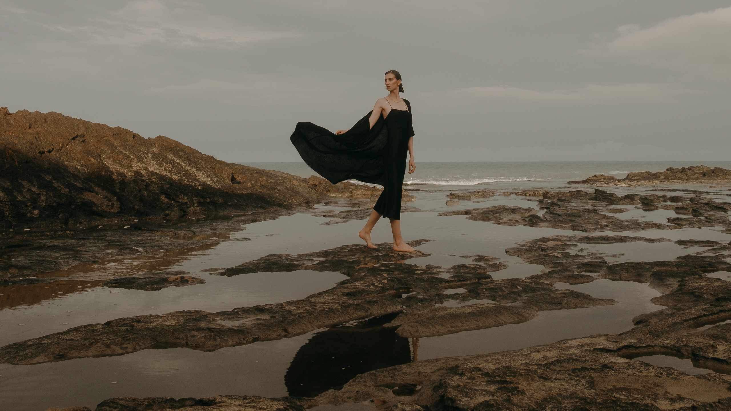 Atmospheric stylized photo shoot by the sea