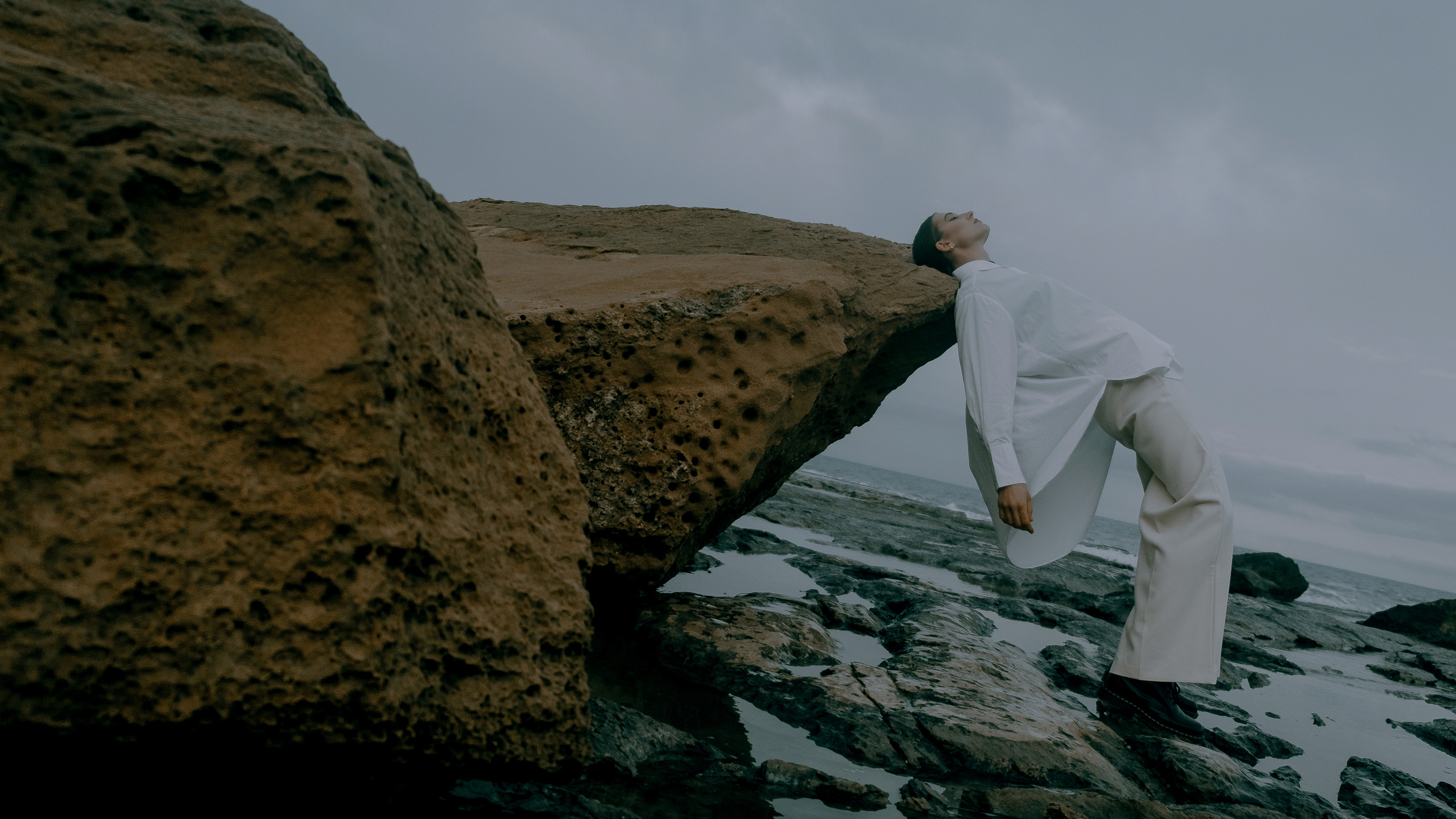 Atmospheric stylized photo shoot by the sea