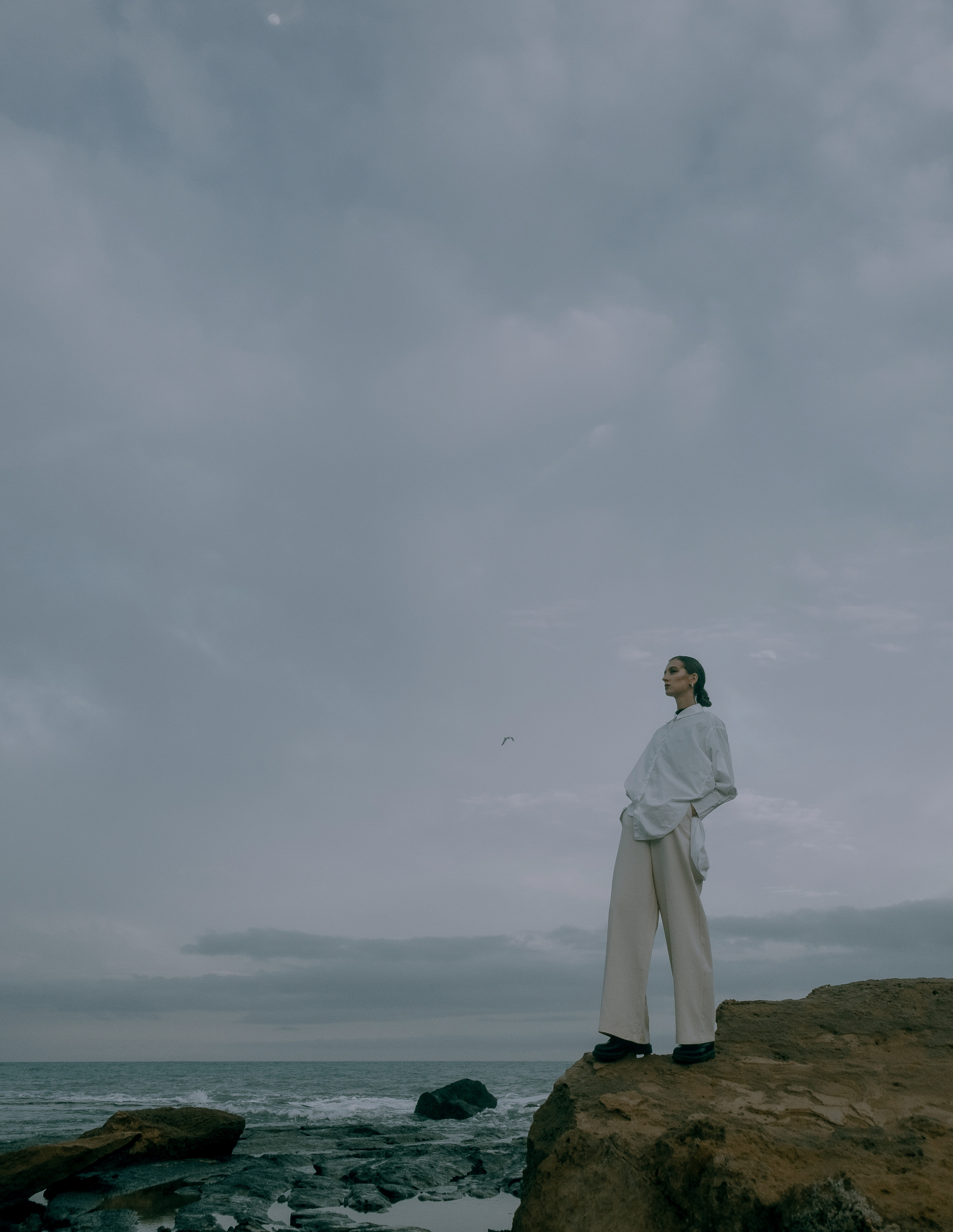 Atmospheric stylized photo shoot by the sea