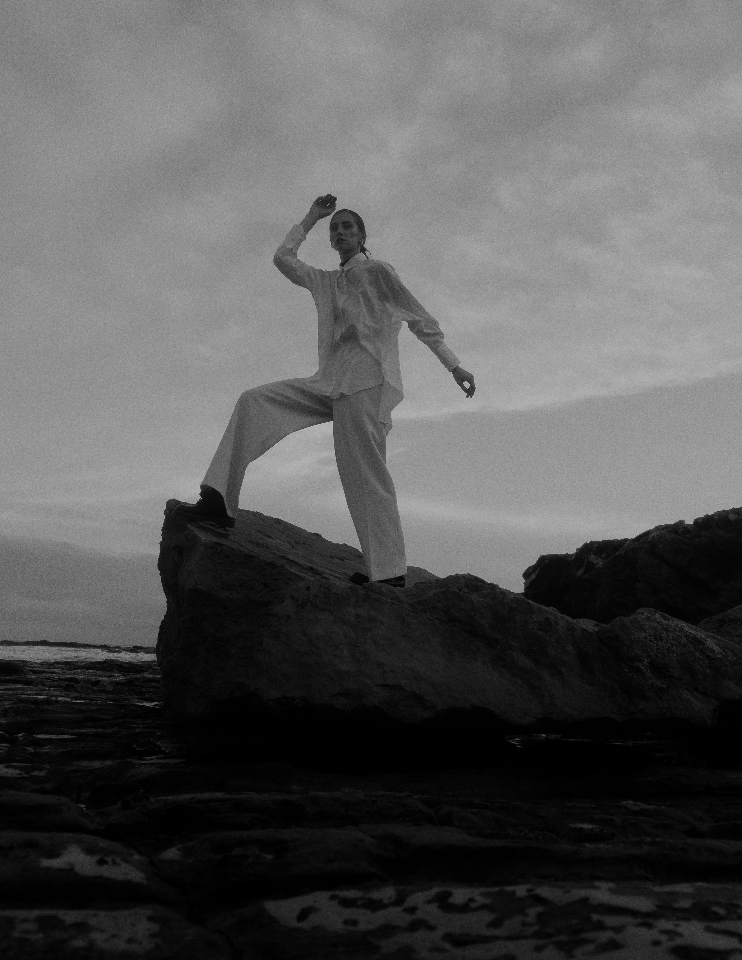 Atmospheric stylized photo shoot by the sea