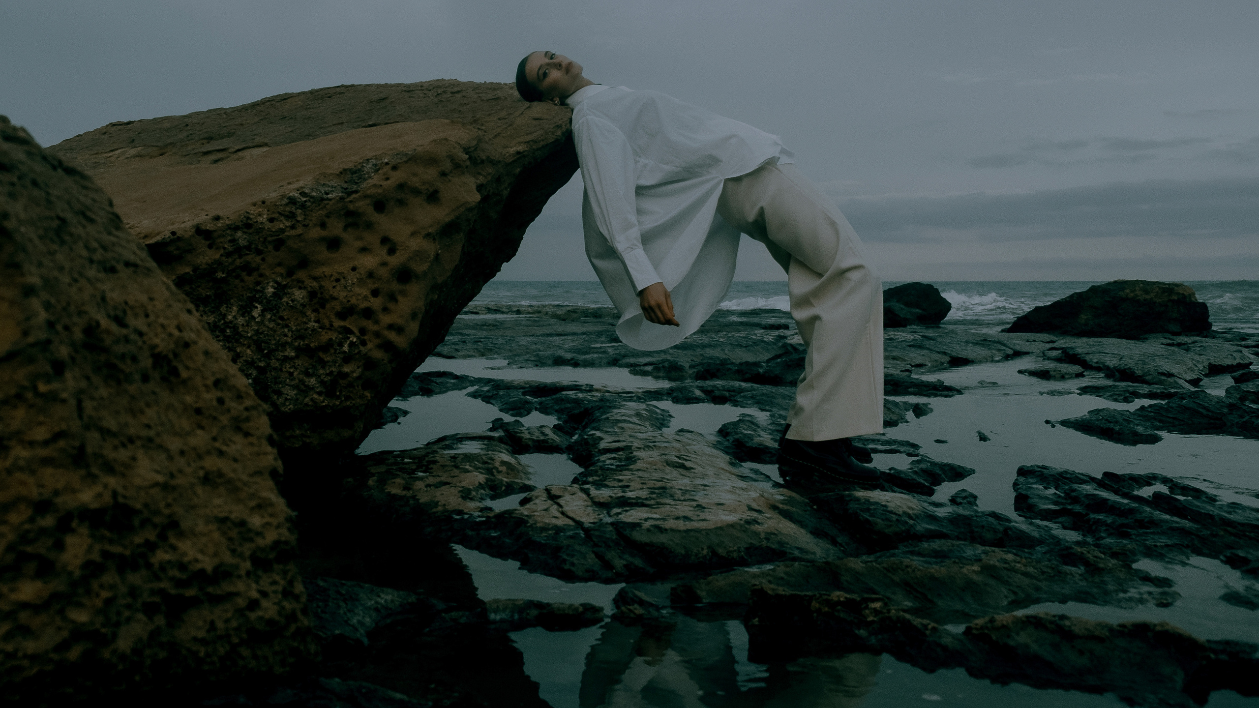 Atmospheric stylized photo shoot by the sea