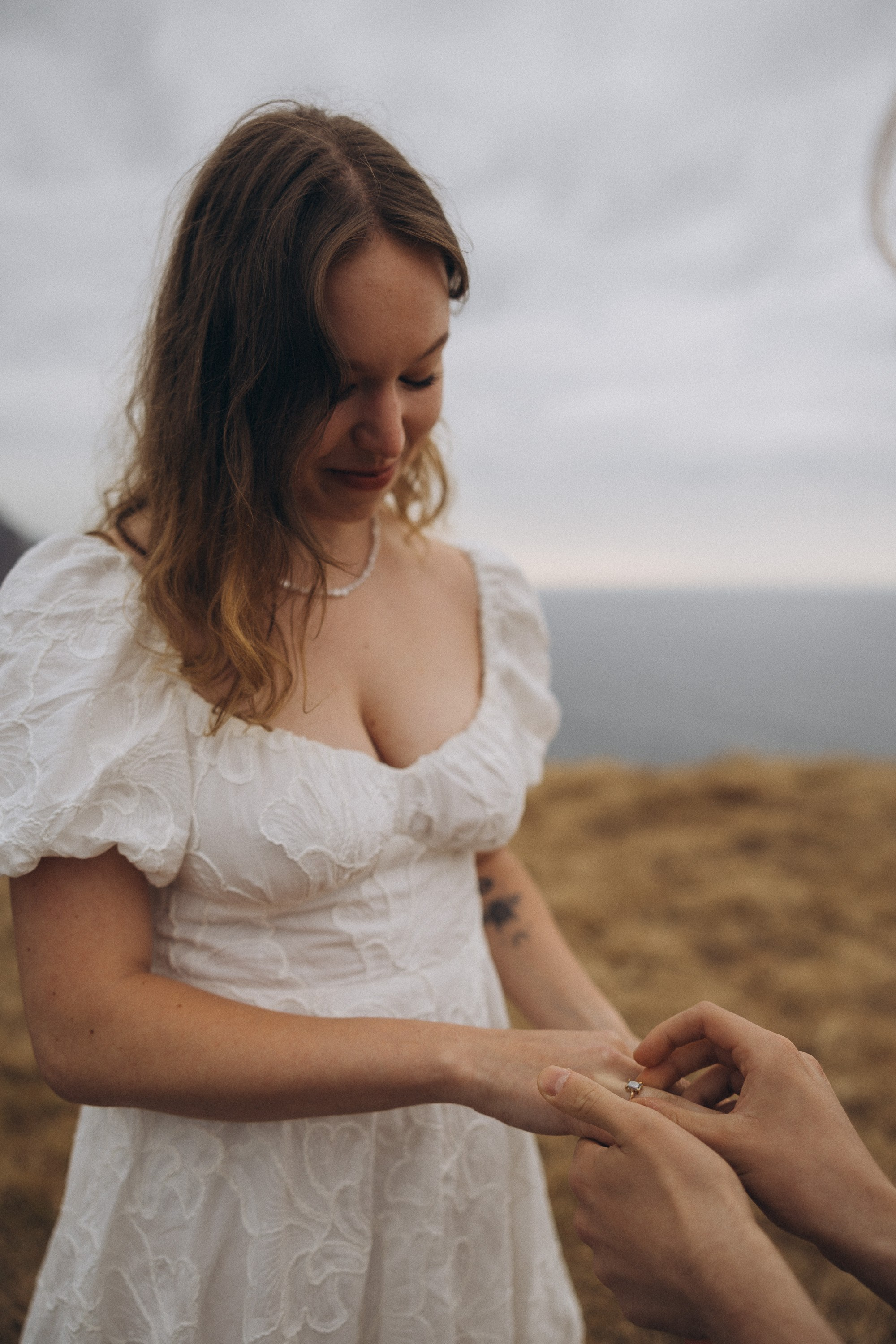 Surprise marriage proposal in São Lourenço, Madeira – romantic couple photography on dramatic coastal cliffs