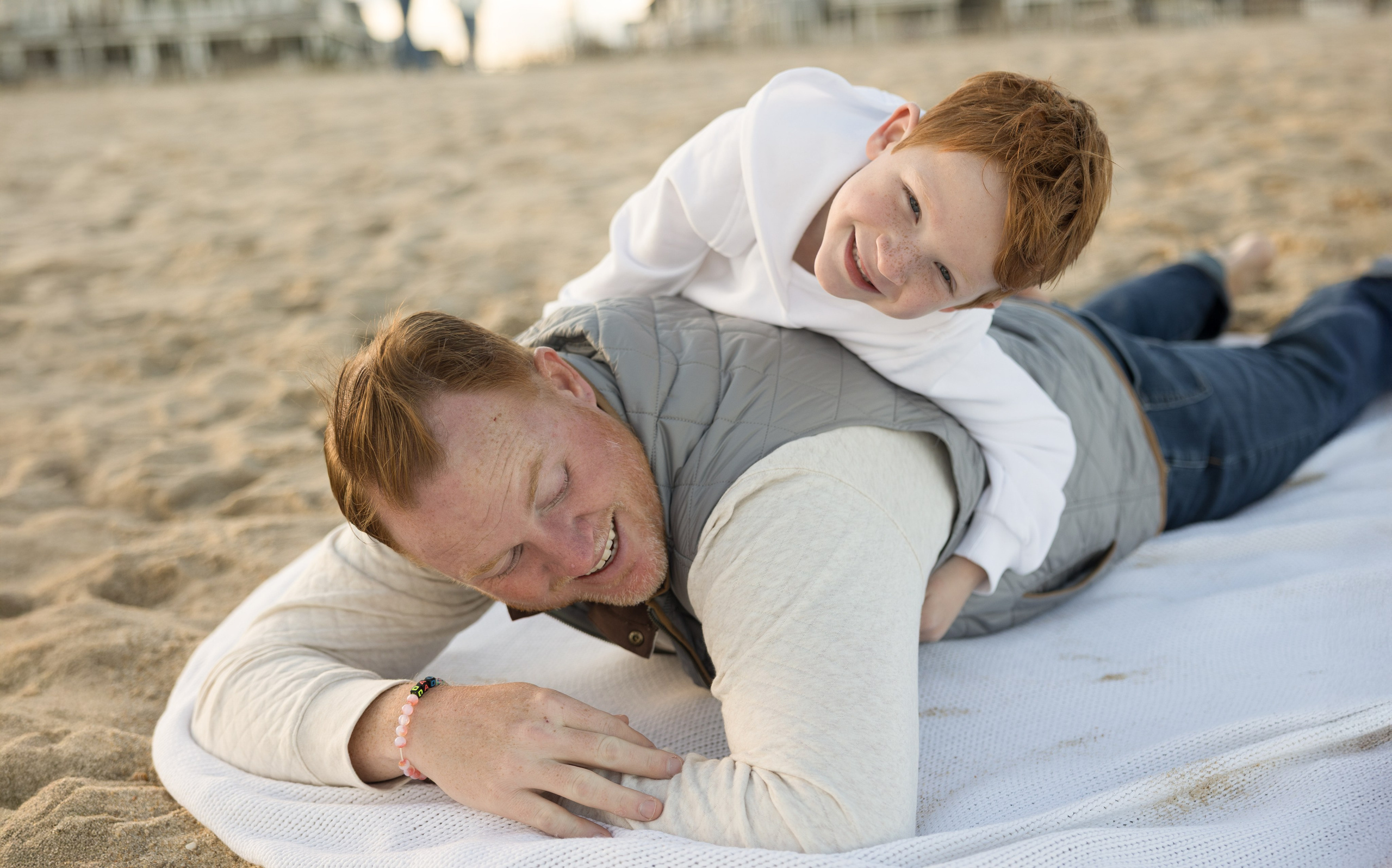 Sun, Sand, and Family Hugs. Family, lifestyle, and commercial photography in New York and New Jersey