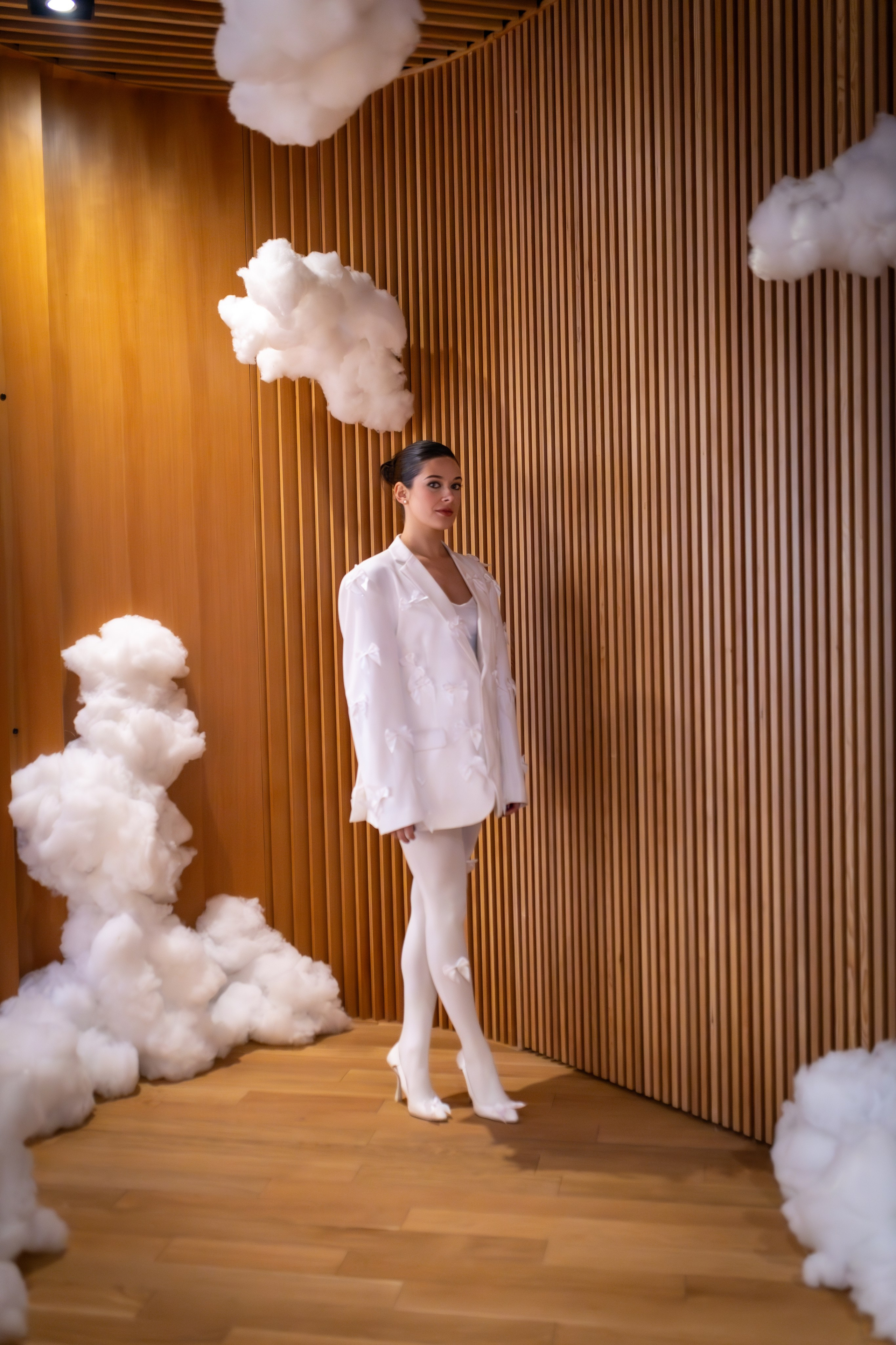 Bold & Timeless: Shelby Morisseau’s Unstoppable Elegance in White. ProFly.club — Professional aerial filming in Calgary