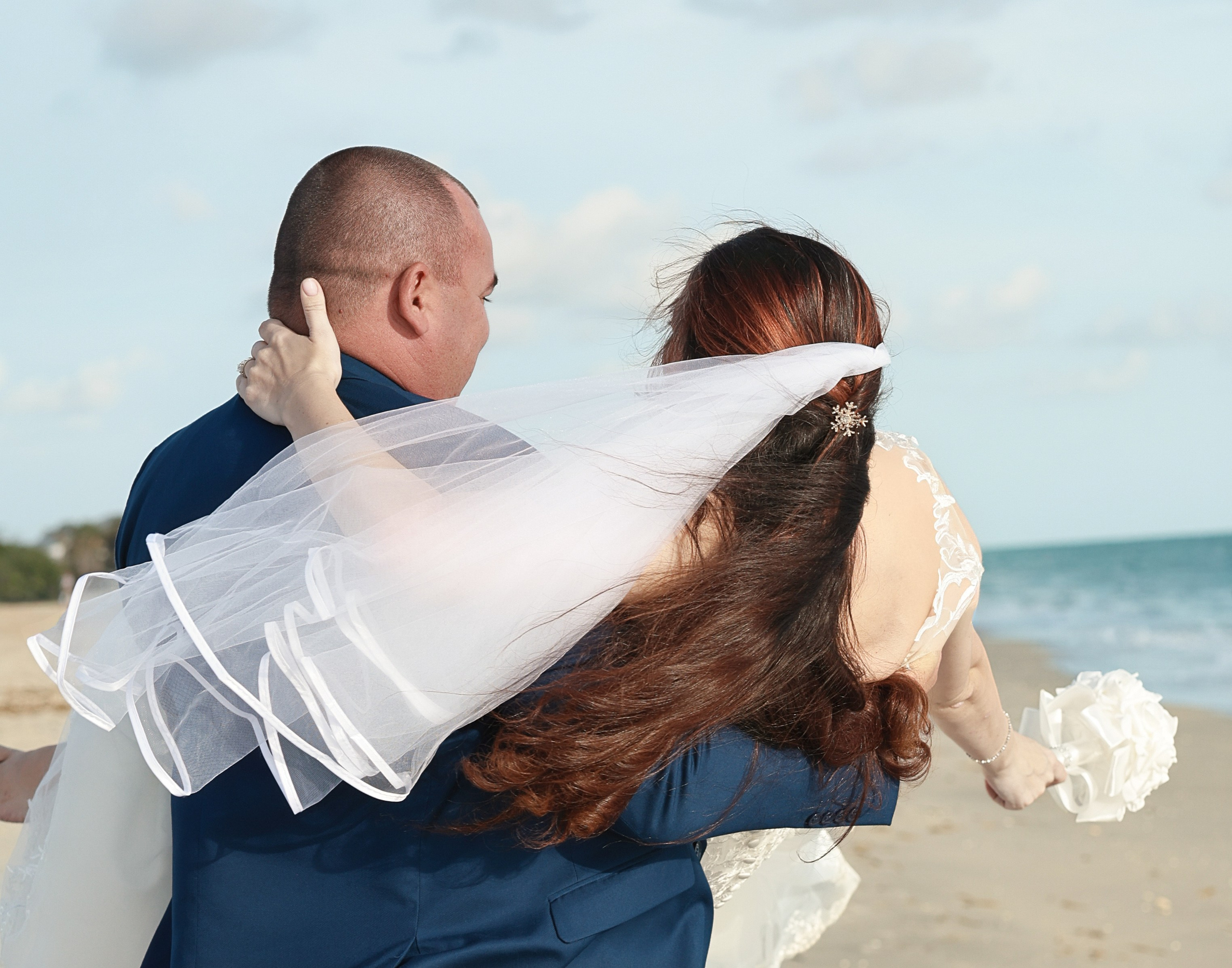 Beach Wedding in Englewood, Florida. Wedding and family photographer Olga Belianskaia