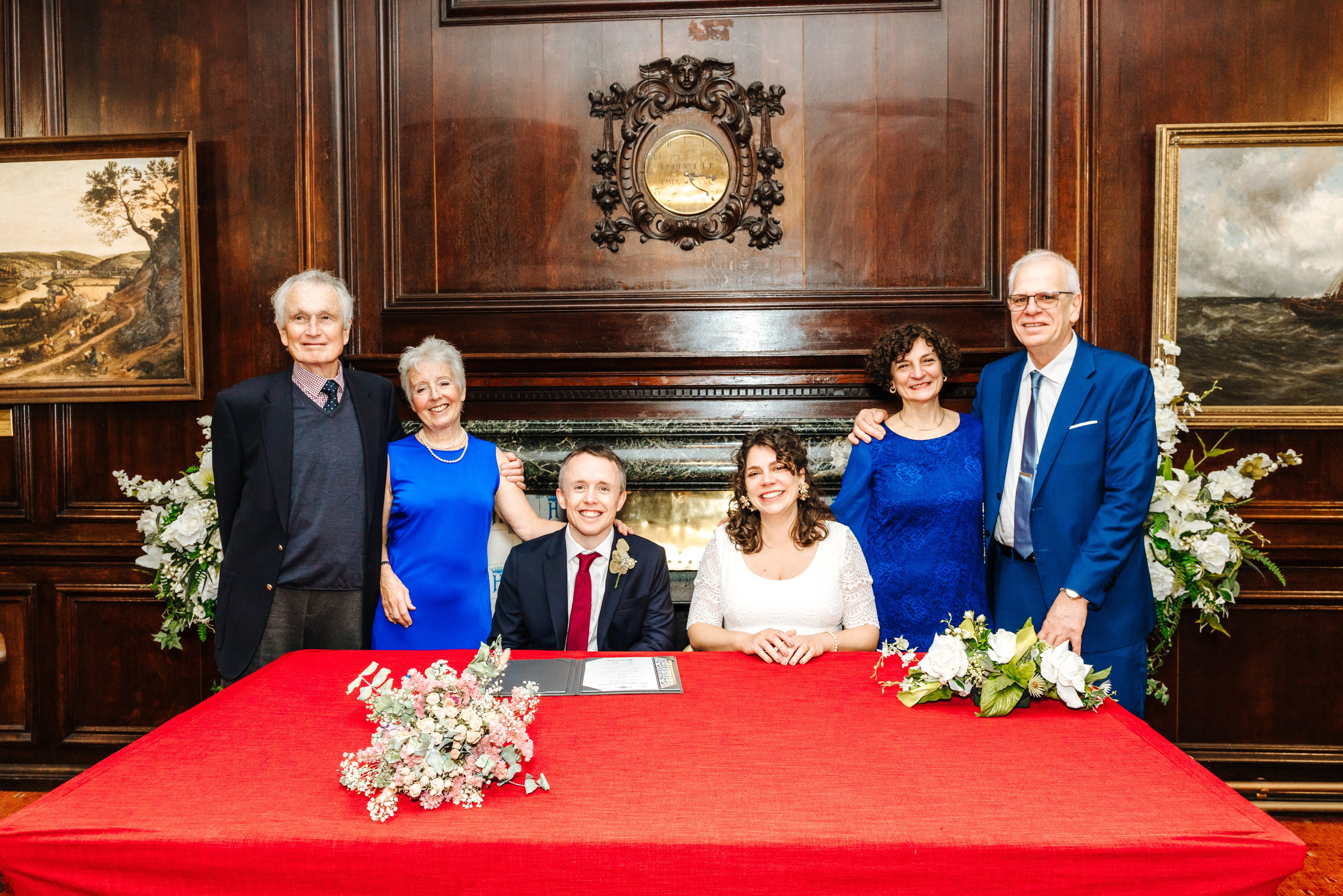Groom and Bride celebrating their wedding with family members at Henley-on-Thames Town Hall.