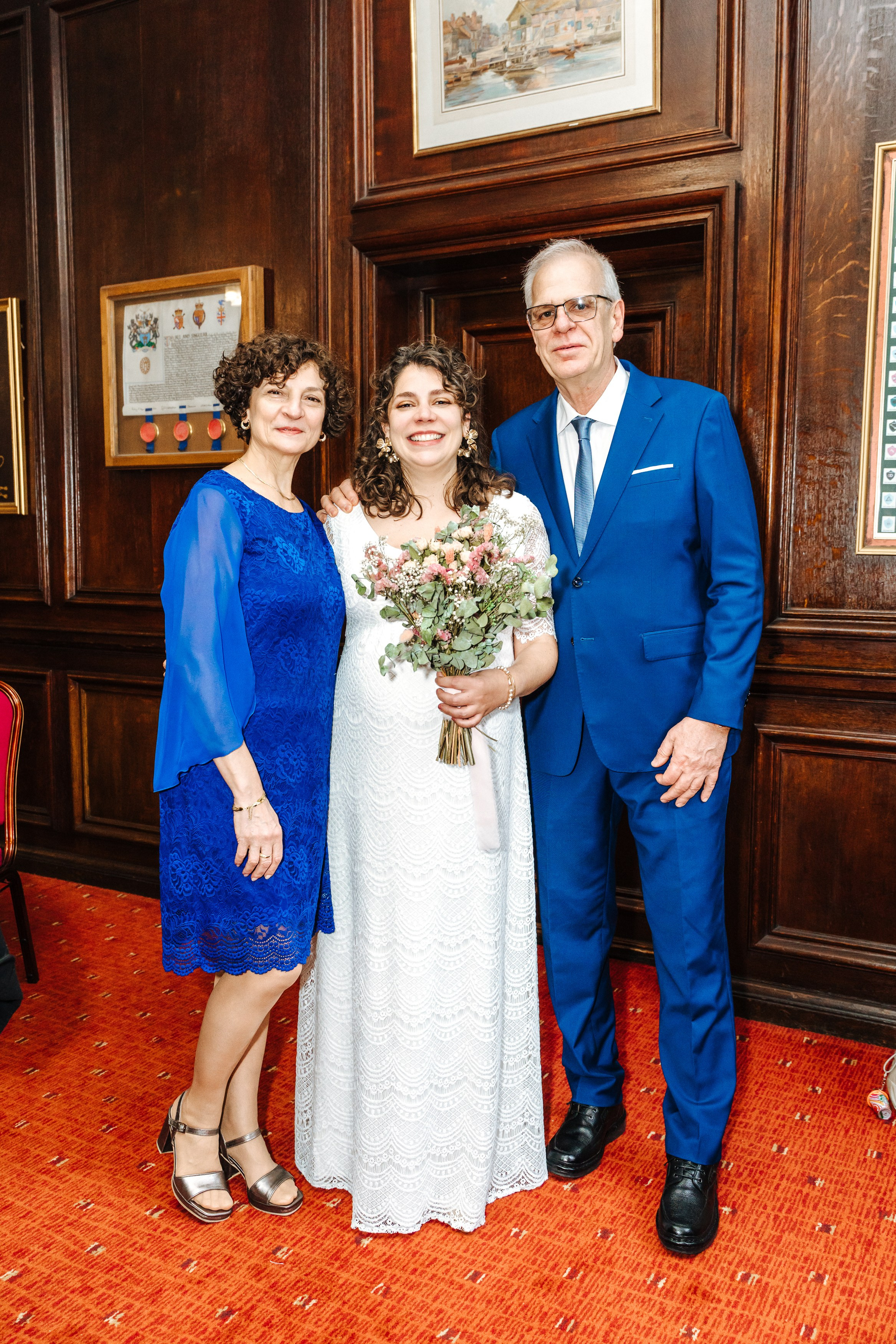Virginia with her parents after the civil wedding ceremony in Henley-on-Thames, Oxfordshire.