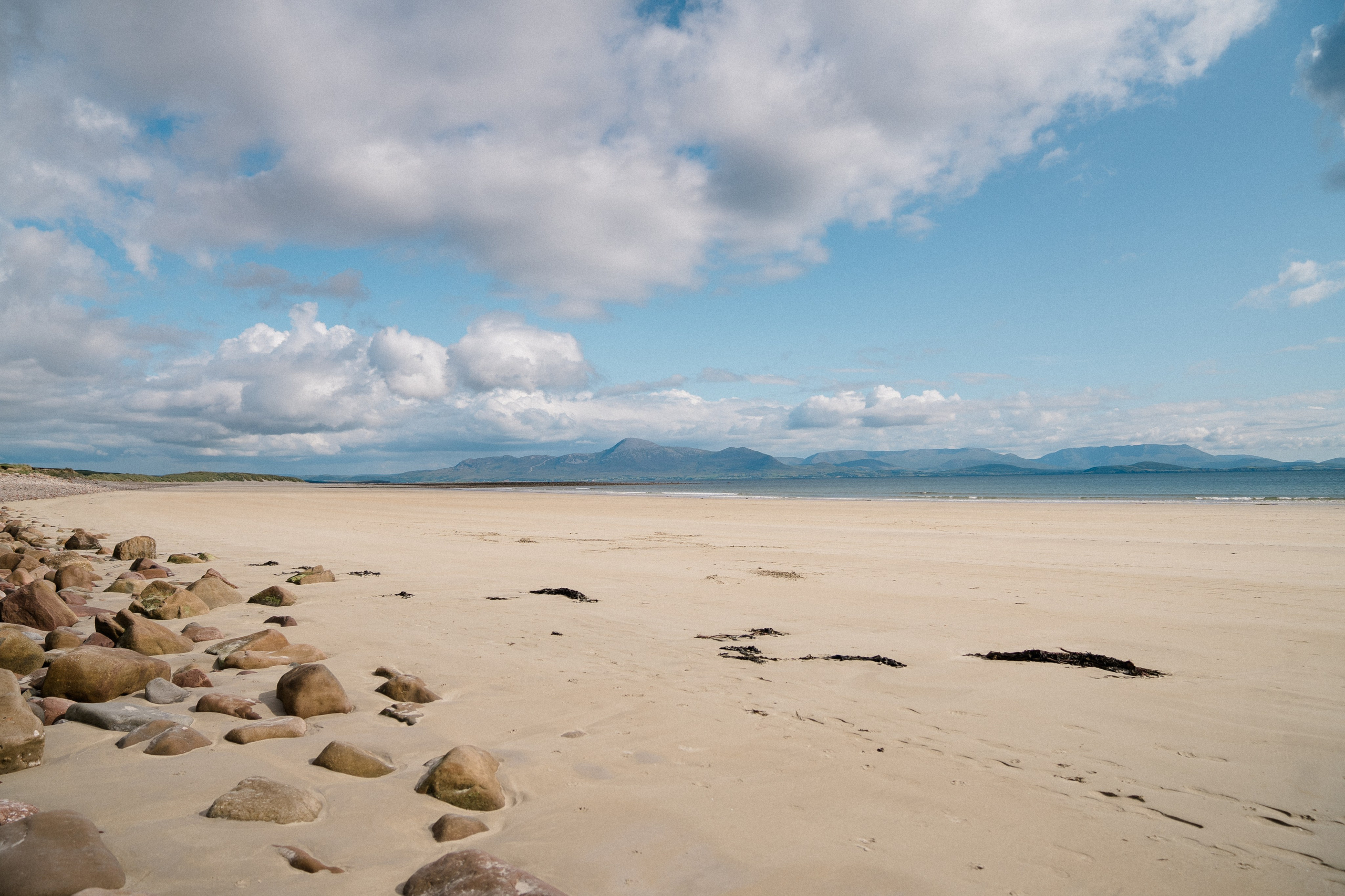 Darya and Mia at the ocean. Wedding and family photographer Ireland