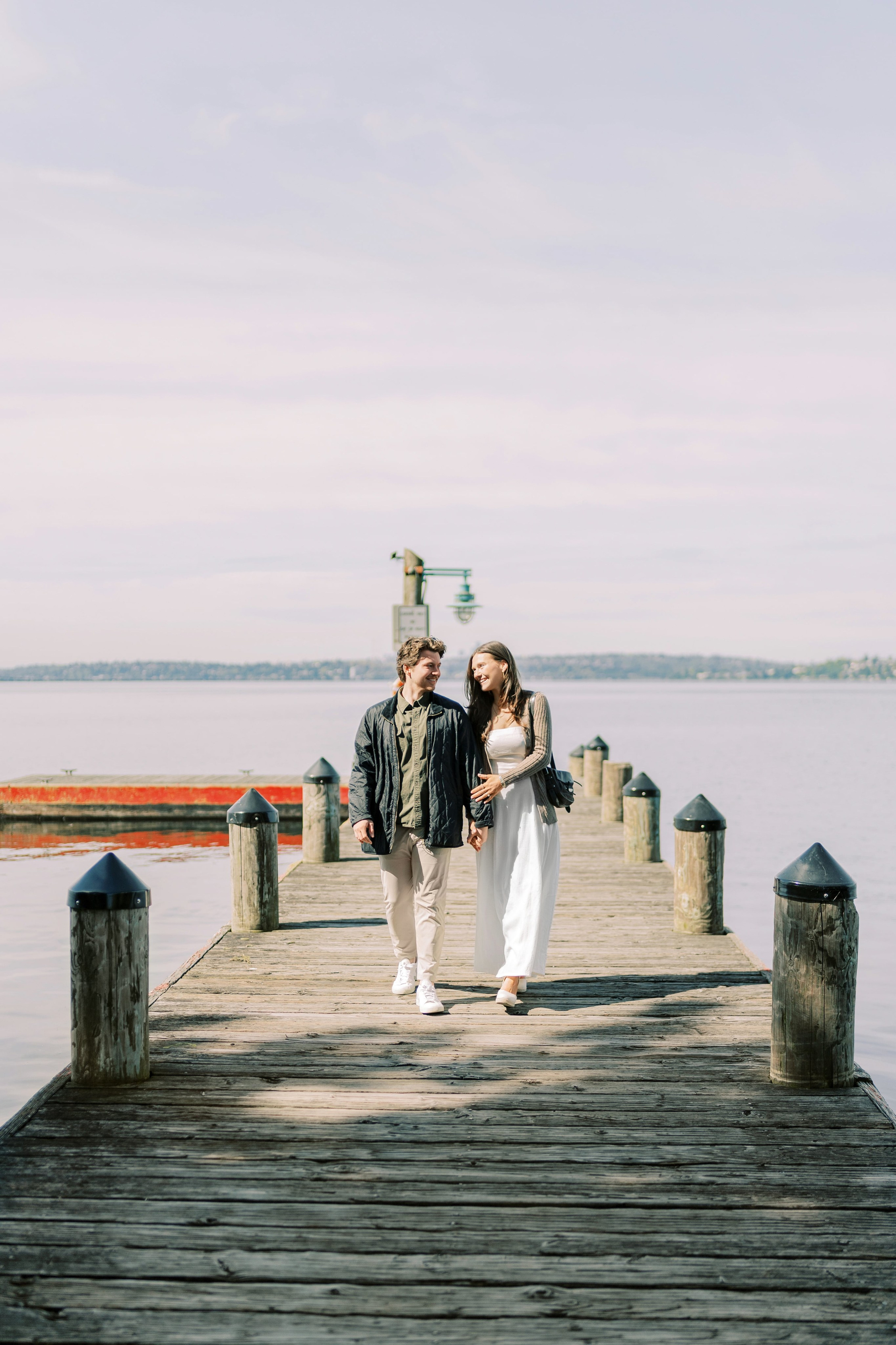 Engagement photo shoot Jake & Caroline / May 2024. Marina Park|Kirkland, WA. EVAN ARISTOV WEDDING PHOTOGRAPHY — Seattle Wedding Photographer