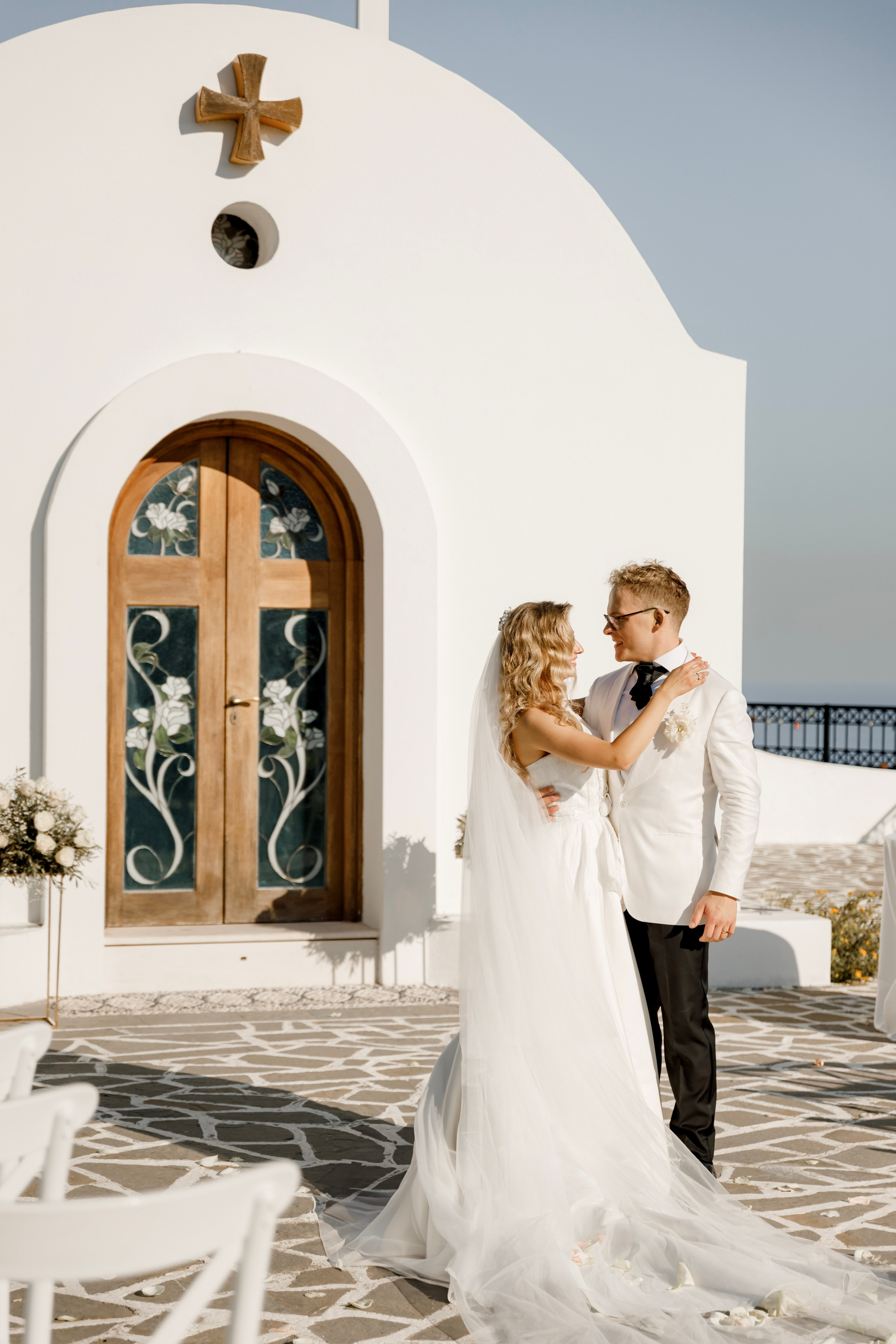 Bride an groom's portrait. Church Agia Sofia in luxury hotel Esperos Village. Rhodes Greece